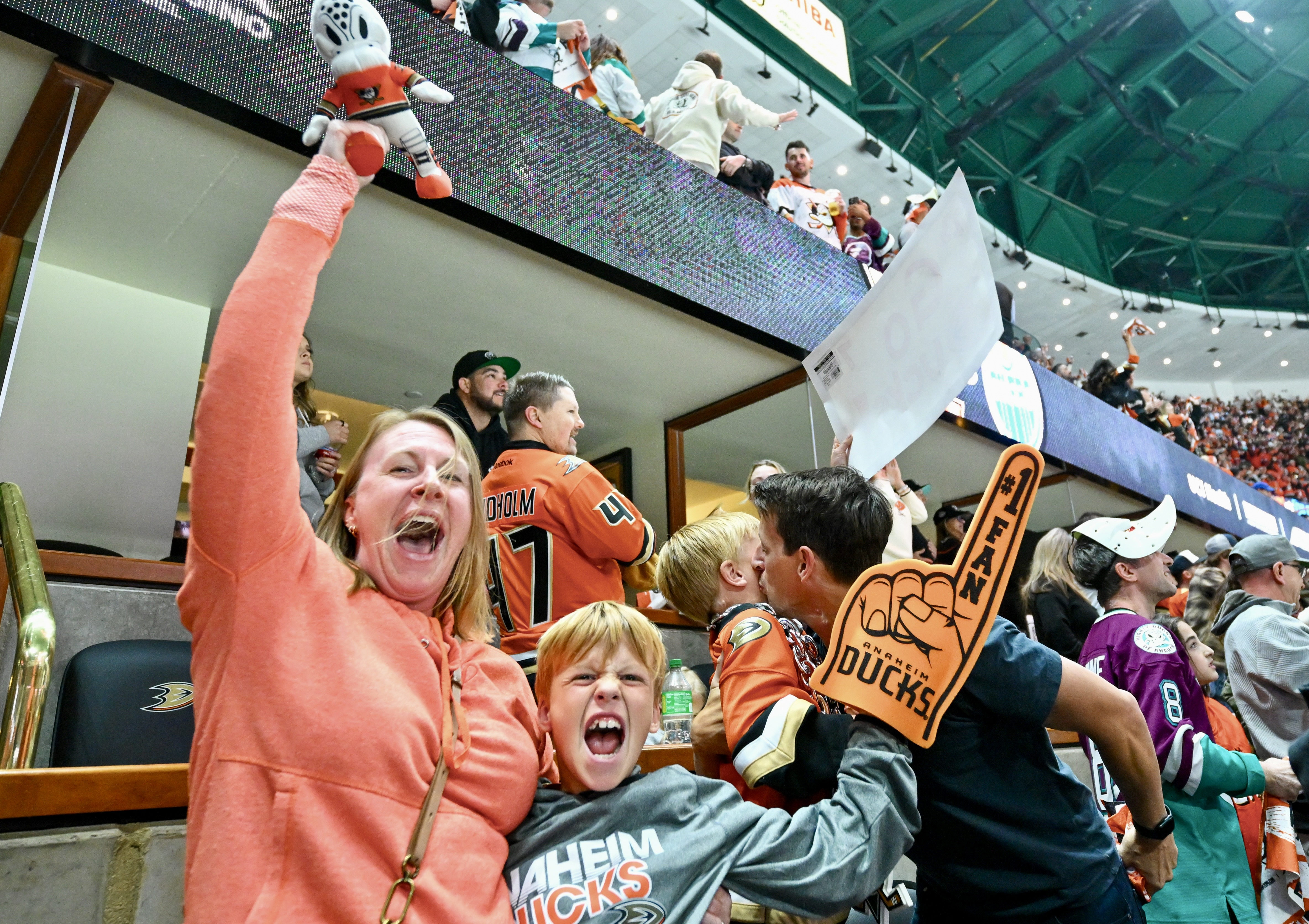 Kelley Bolar and her son, Emmett Calvert, 9, celebrate the...