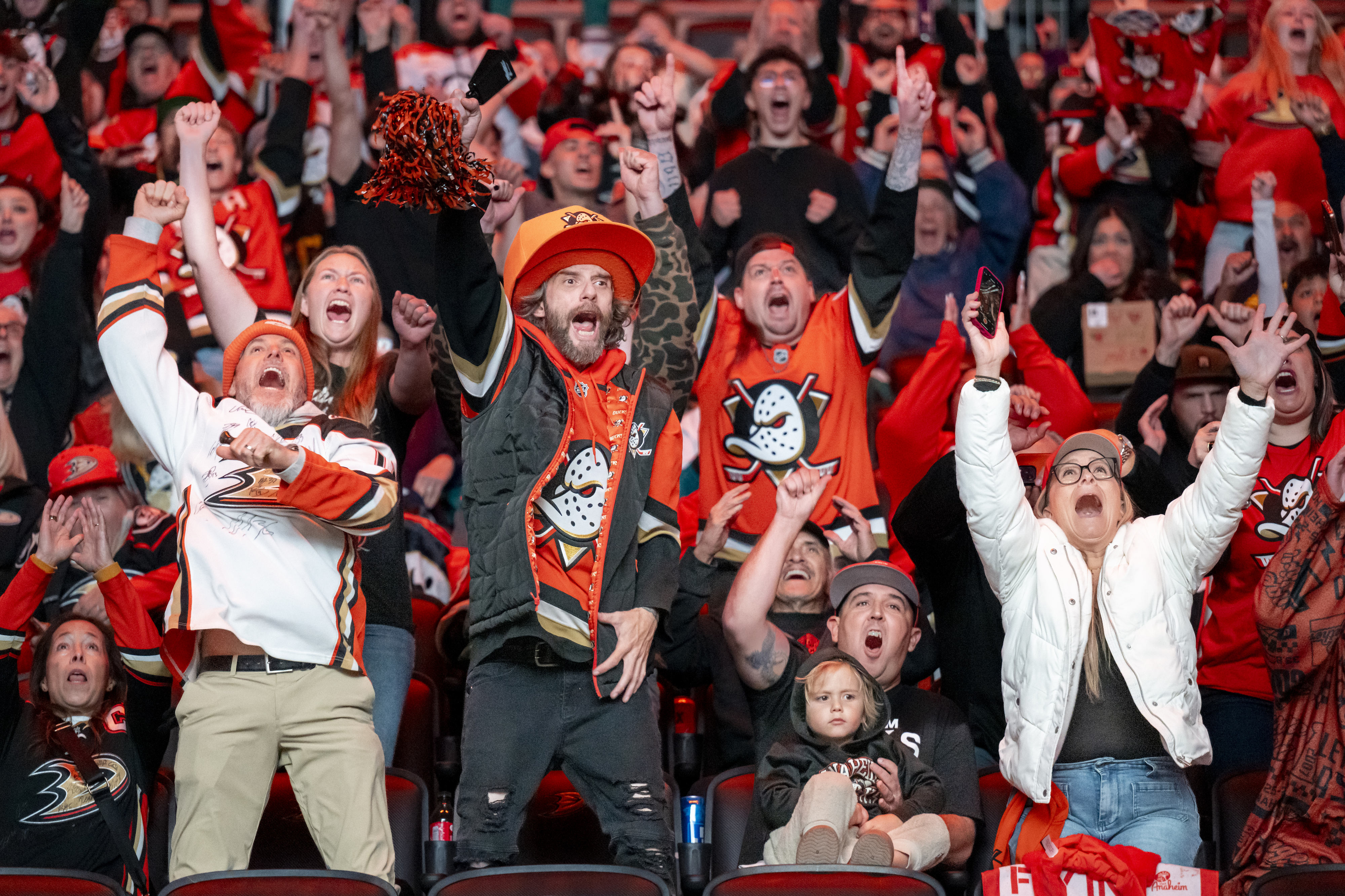 Ducksâ fans react when the Ducks score a goal in...