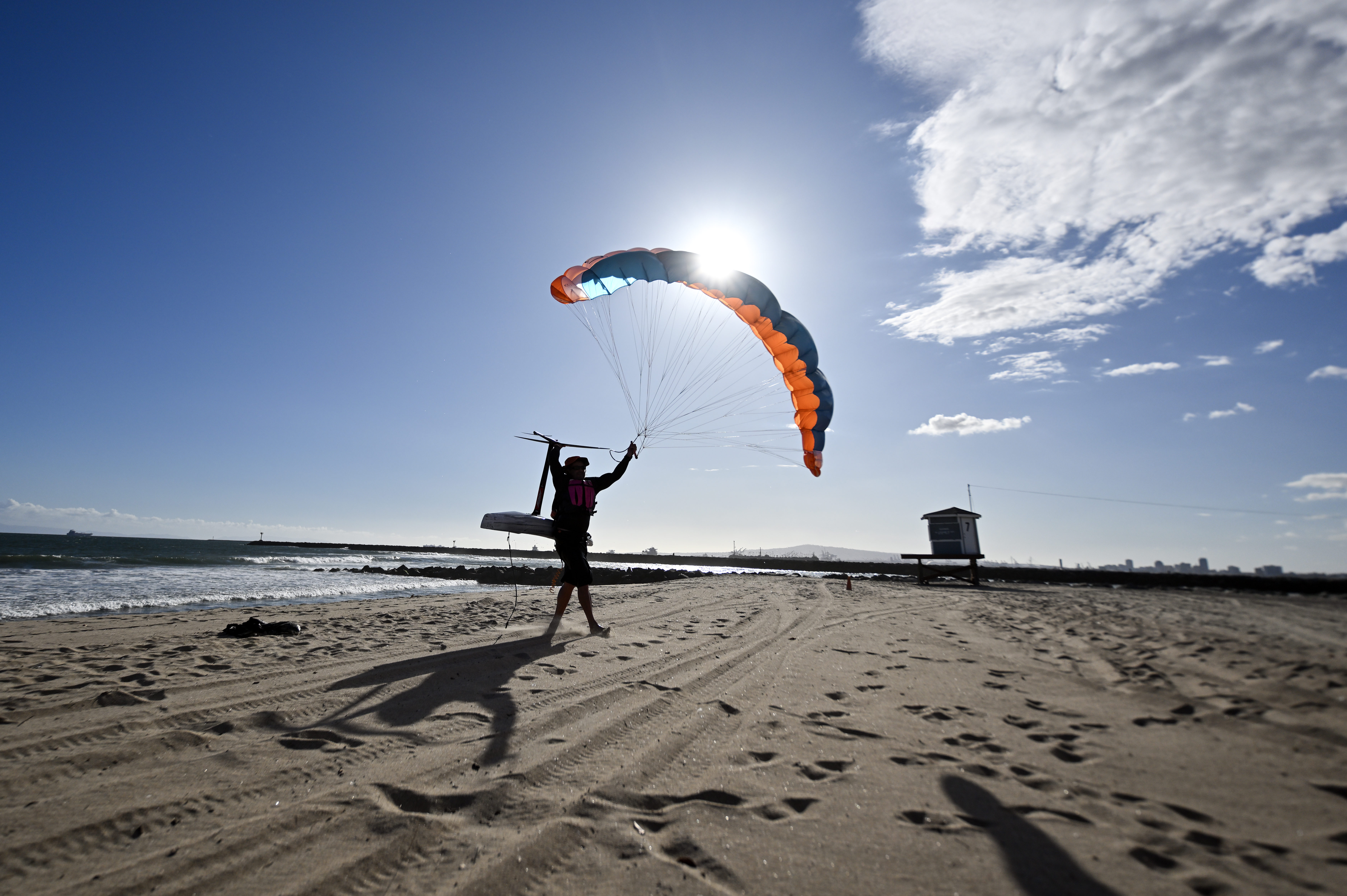 Kiteboarder Stephen Nowak, of Crestline, holds on his kite as...