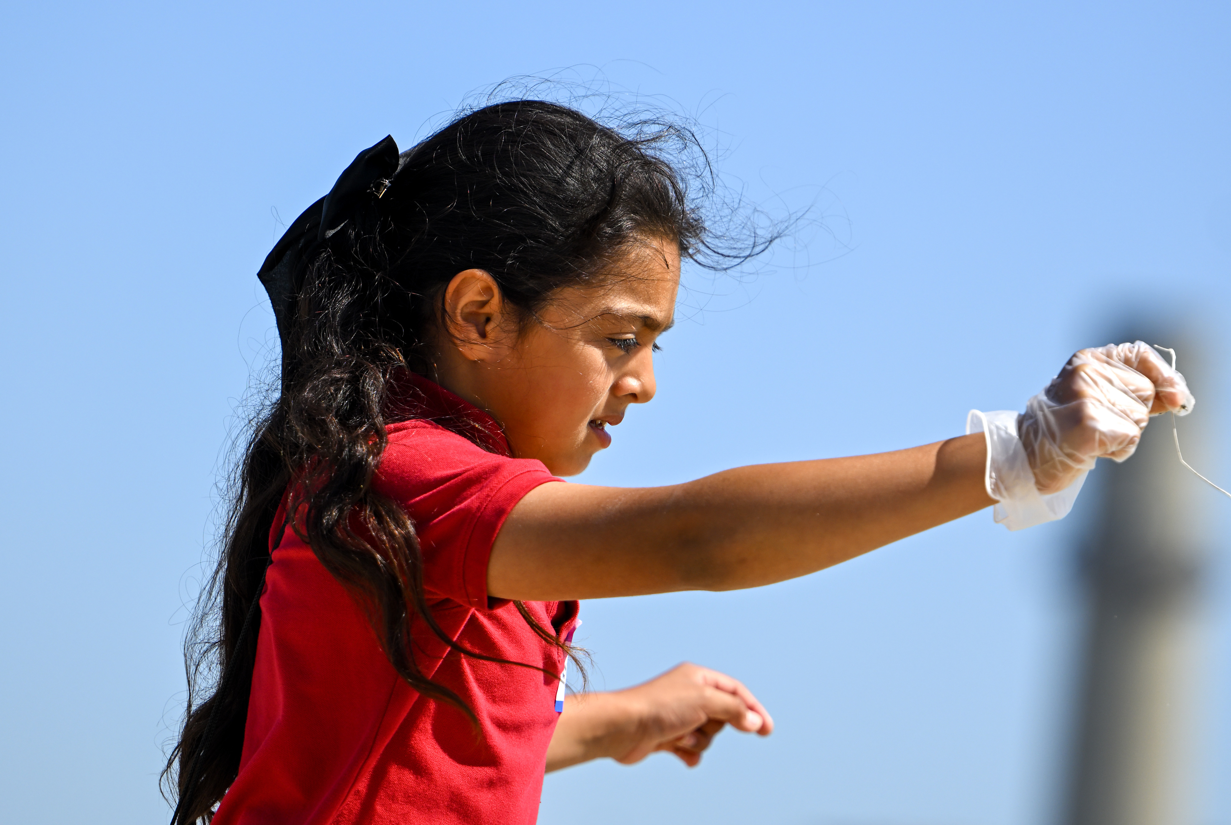 Abigail Alvarado, from Handy Elementary School, finds a small piece...