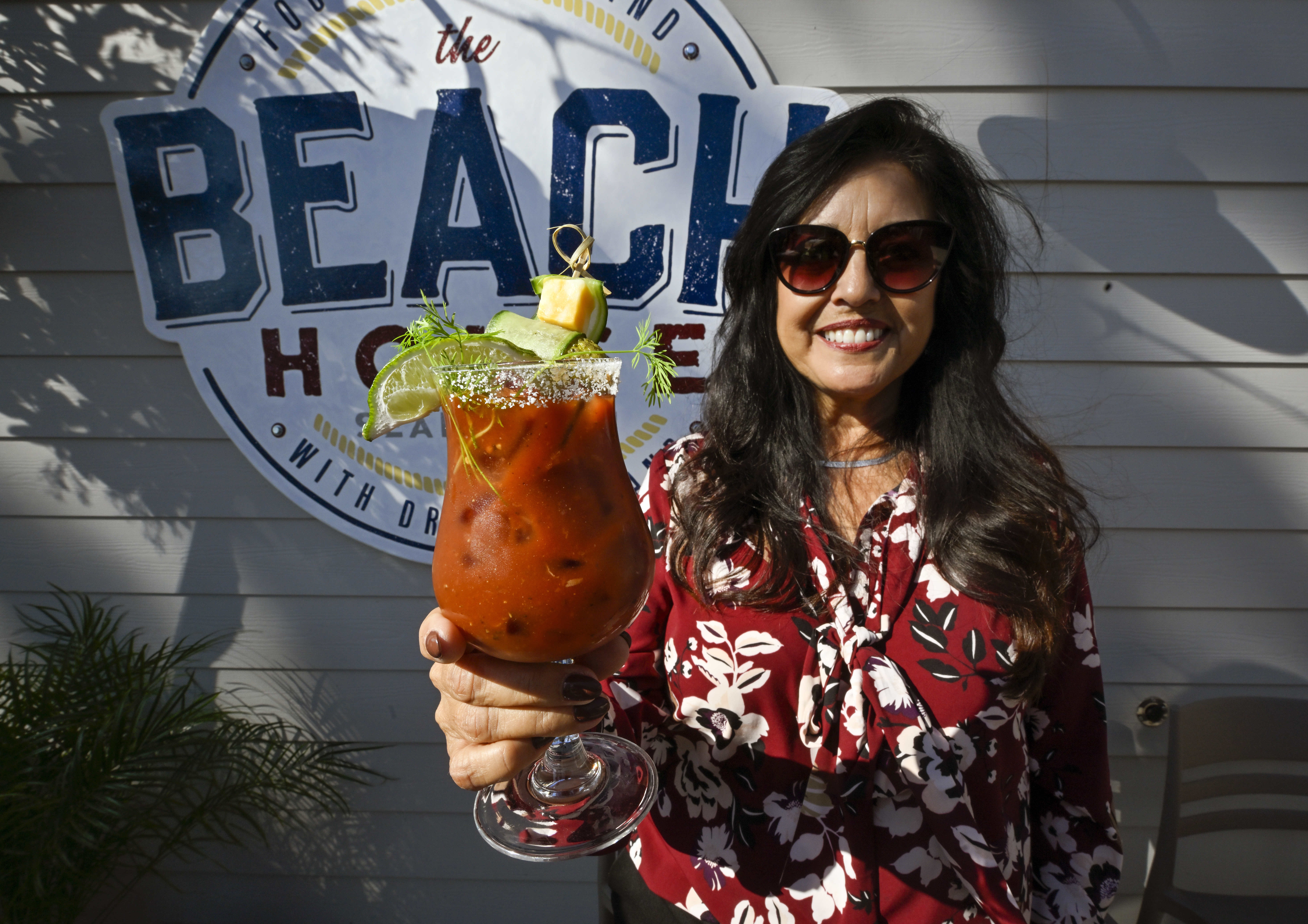 Rosie Ritchie, co-owner of The Beach House shows off their...