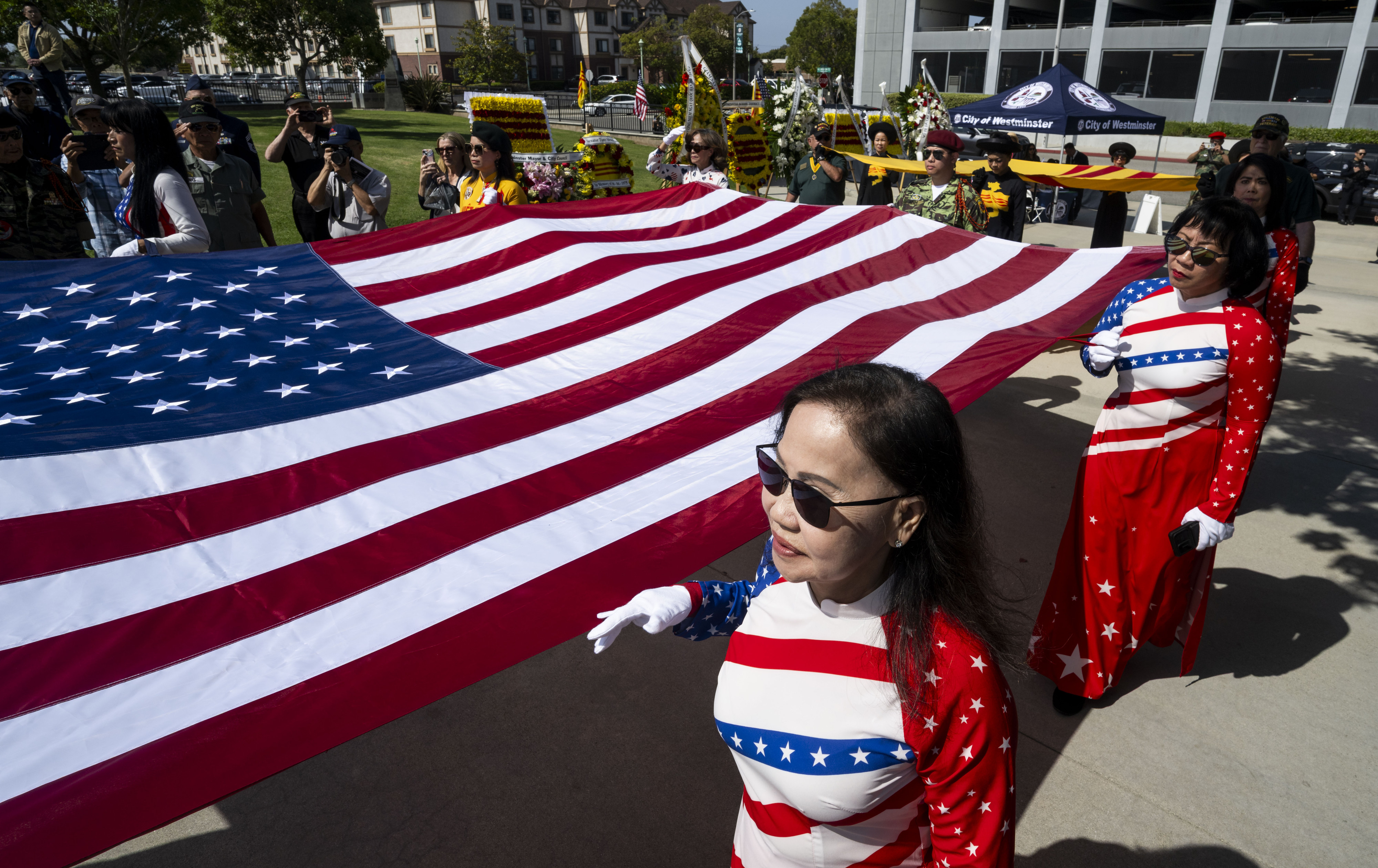 Groups participate in the presentation of colors during a Black...