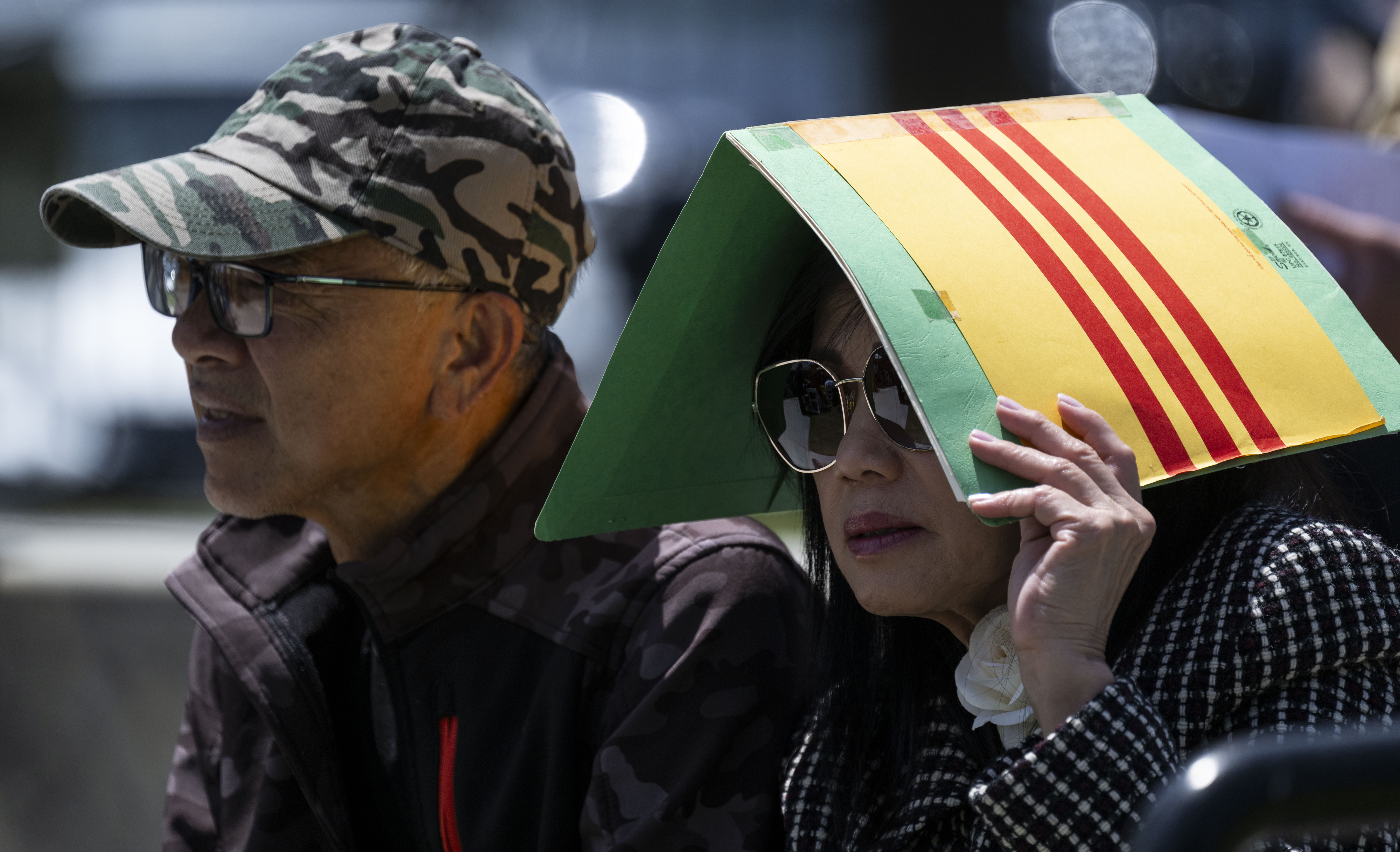 People listen to speakers during a Black April Remembrance Ceremony...