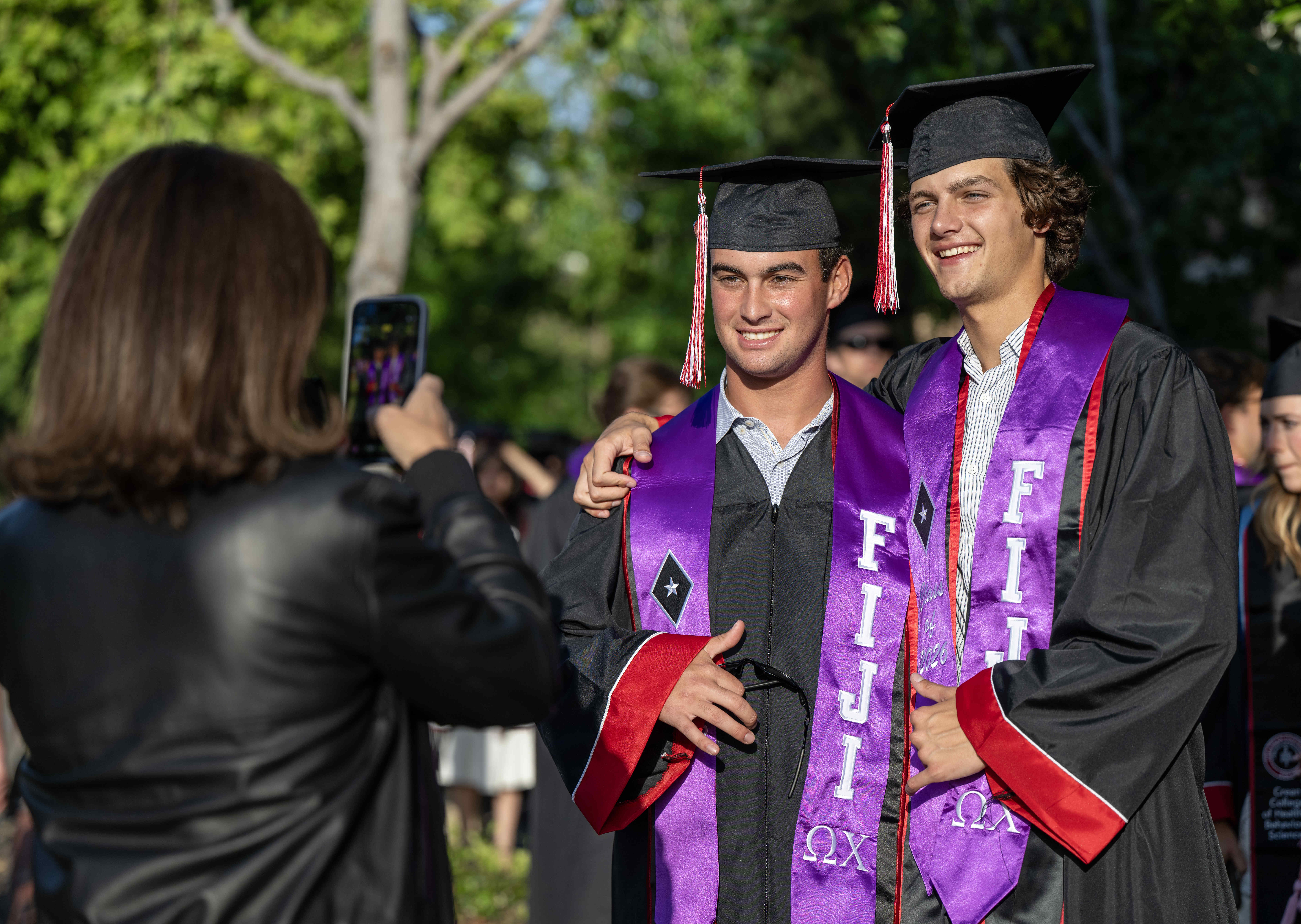 Friends and fraternity brothers Marco Asiano, left, and Robbie Cullerton,...
