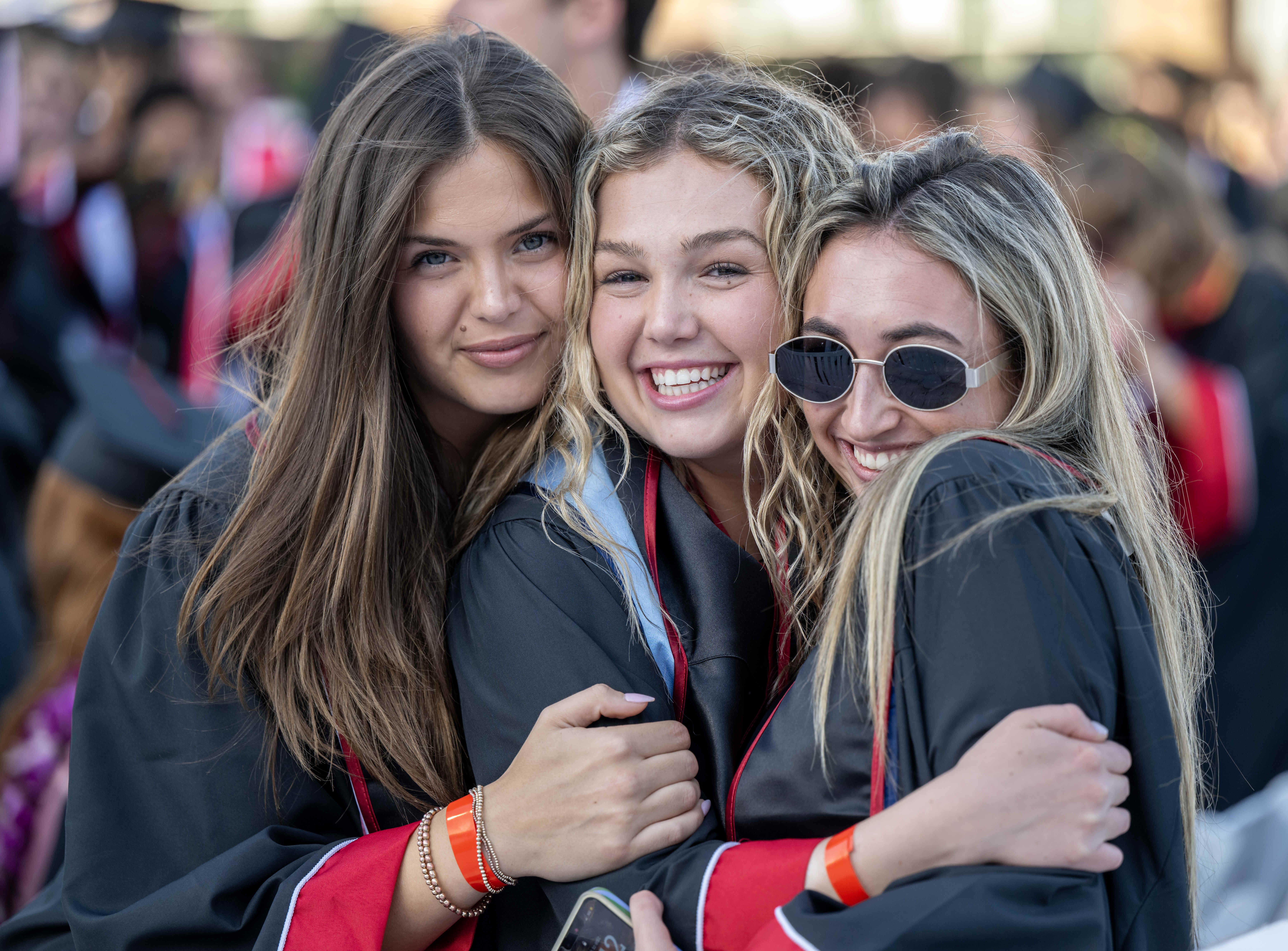 Friends Hannah Foxx, Eva Healey and Sophia Taxin, from left,...