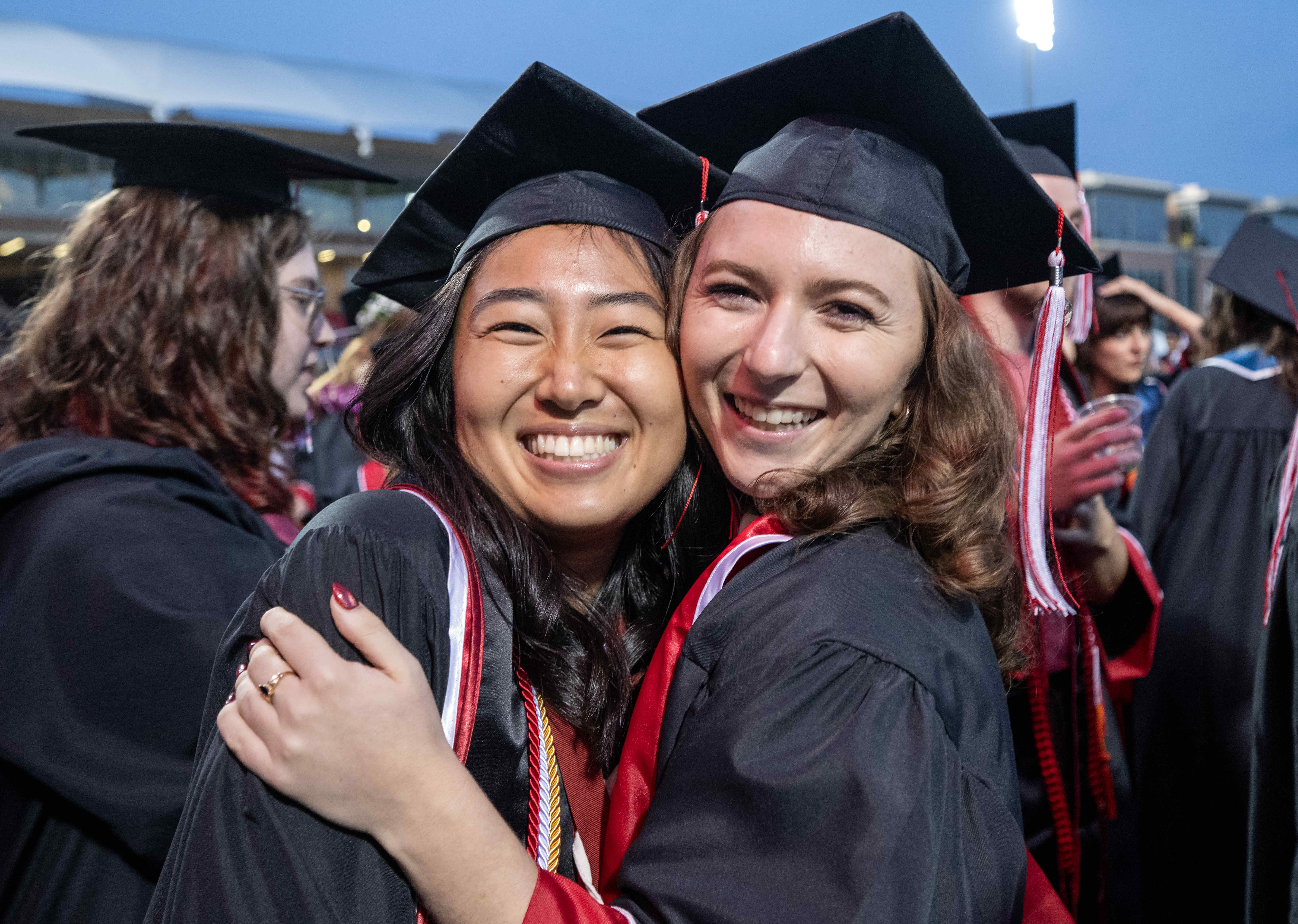 Friends Sophia Arendt, left, and Natalie Jakoda celebrate together at...