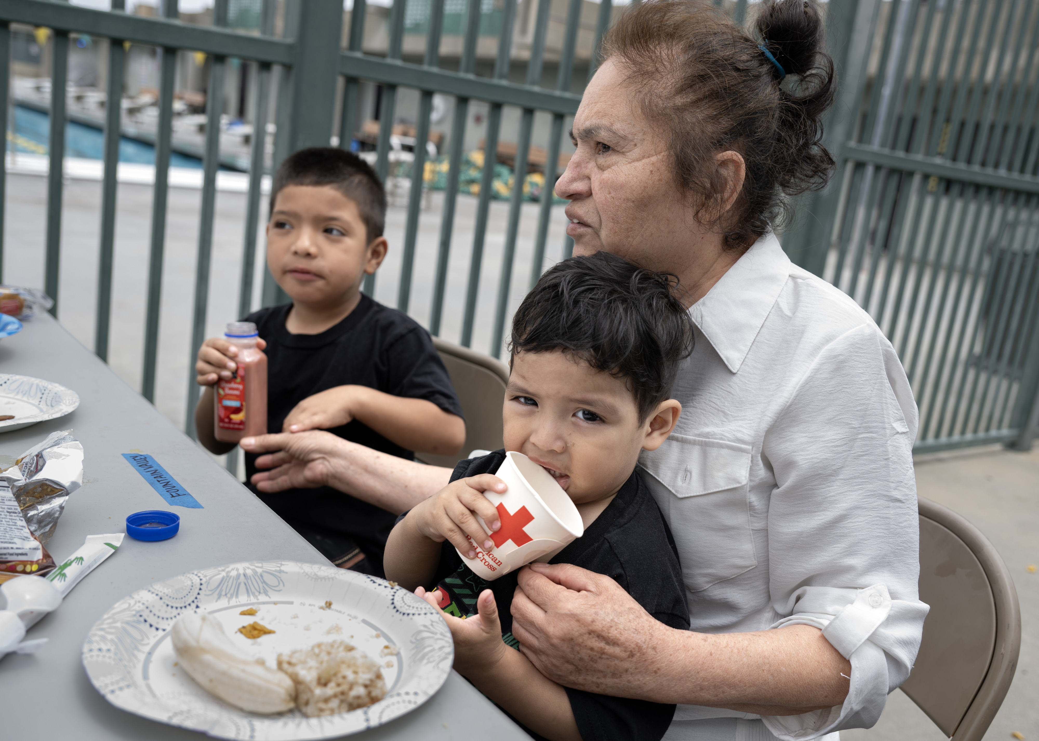 Maria Lopez holds her 1-year-old grandson, Jordan, at the Golden...