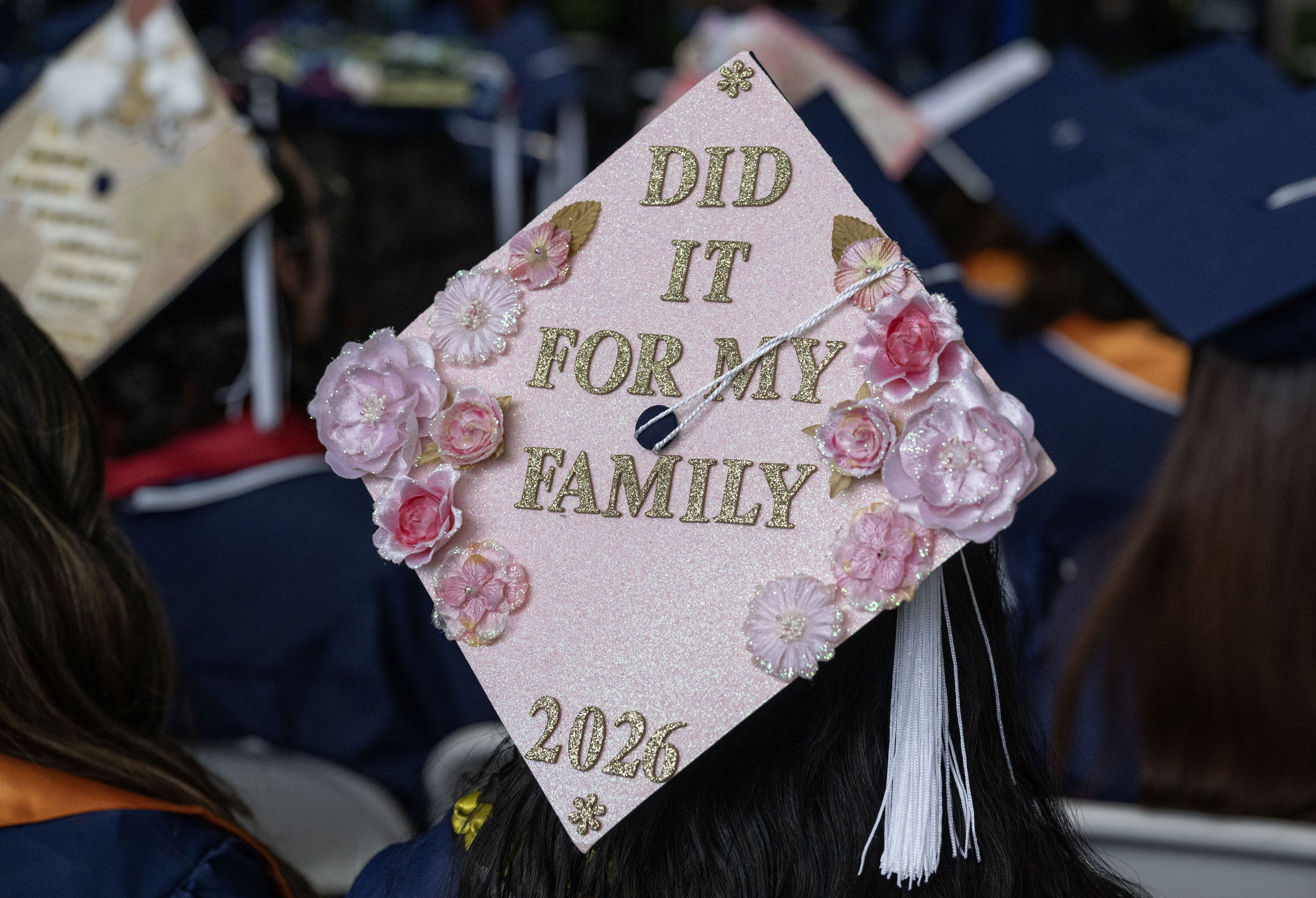 A mortarboard message pays homage to the family of a...