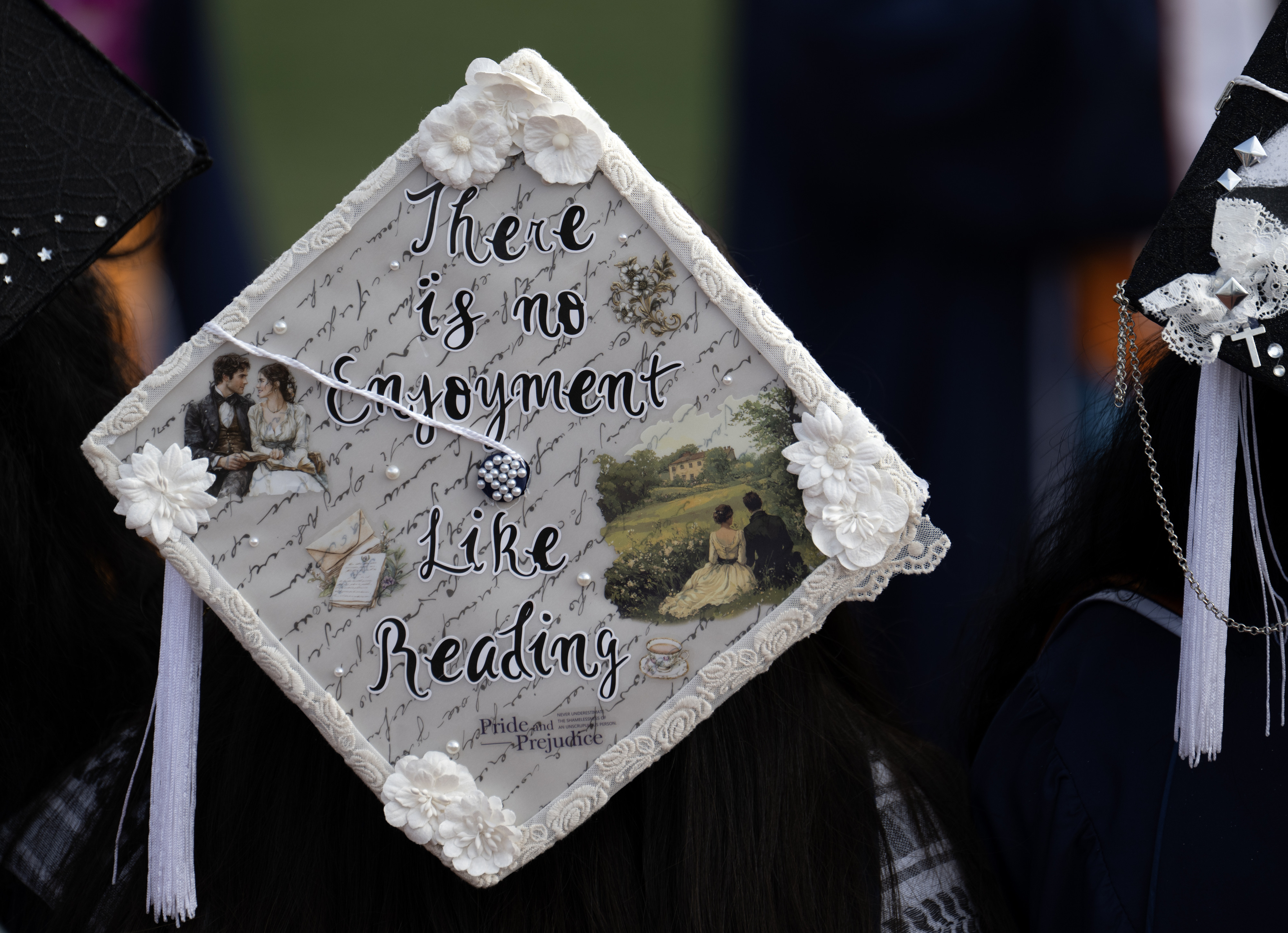 Perhaps this grad can enjoy more reading time after commencement...
