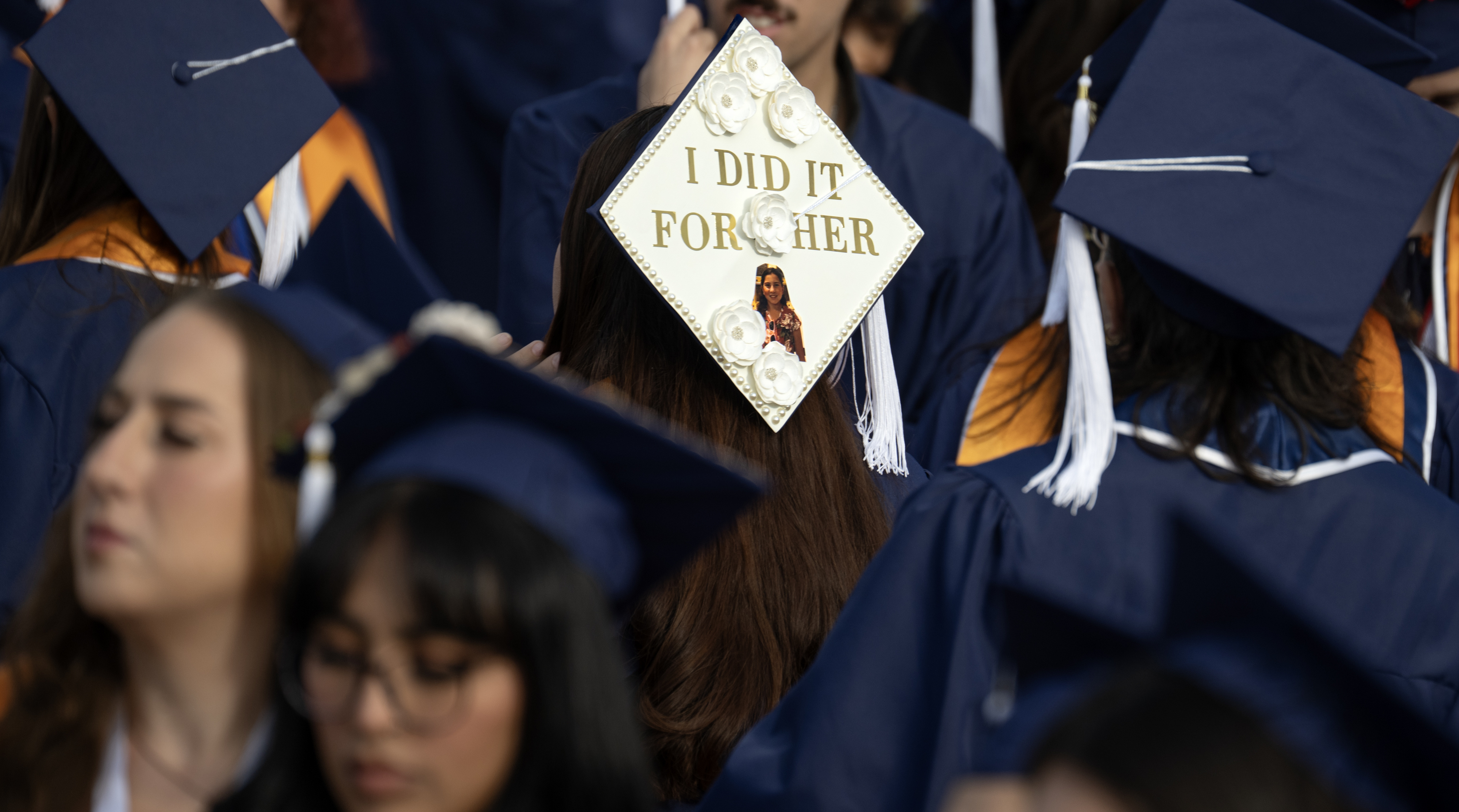 A mortarboard pays tribute to a special person during Cal...