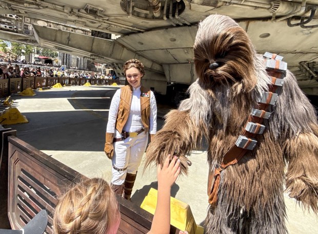 Princess Leia and Chewbacca greet visitors at Star Wars: Galaxy's Edge inside Disneyland on Wednesday, April 26, 2926, in Anaheim. Disney is changing up Batuu, adding Darth Vader, Luke, Skywalker, Han Solo and Princess Leia to the land. (Photo by Jeff Gritchen, Orange County Register/SCNG)