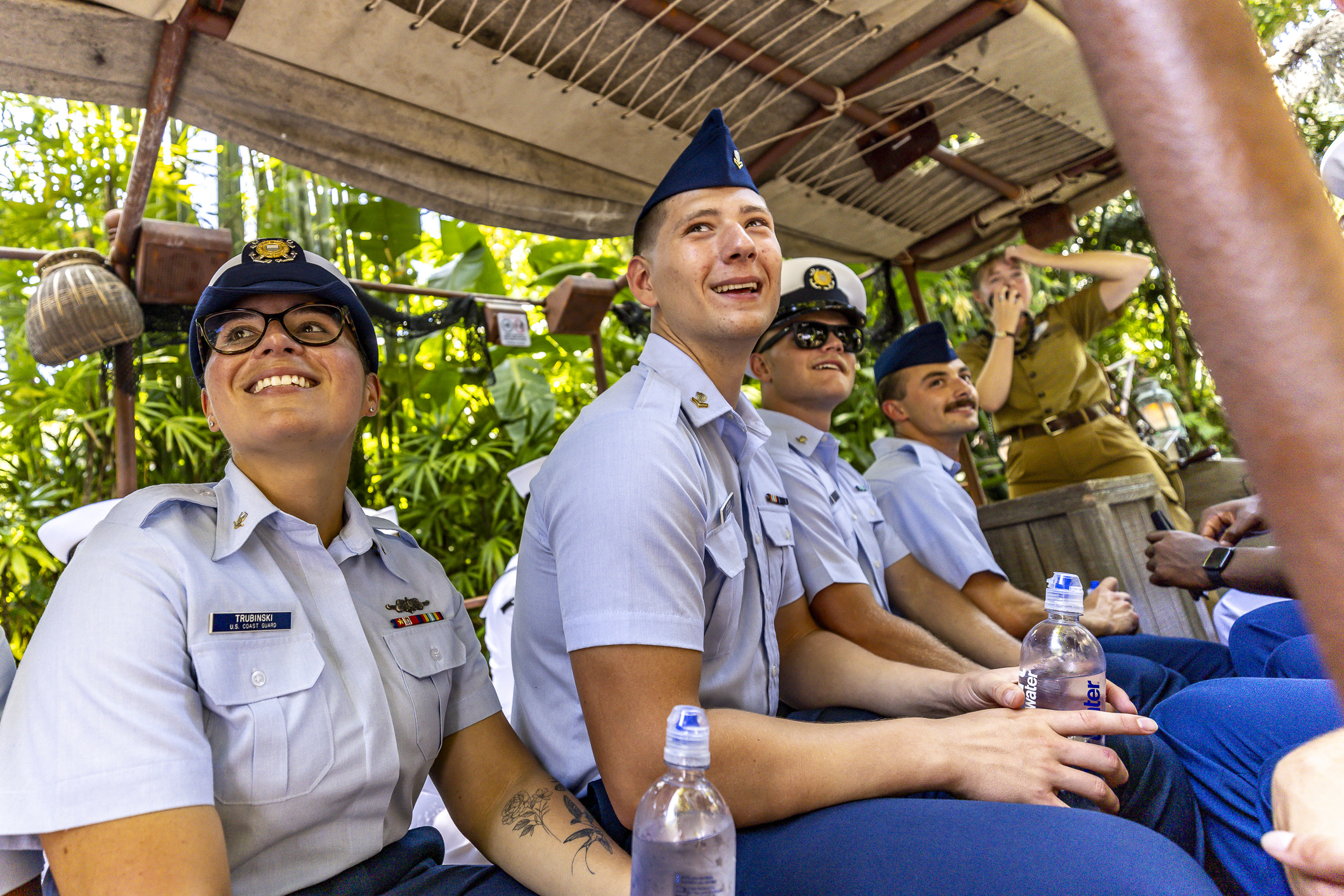 U.S. Sailors and Coast Guardsmen ride the Jungle Cruise at...