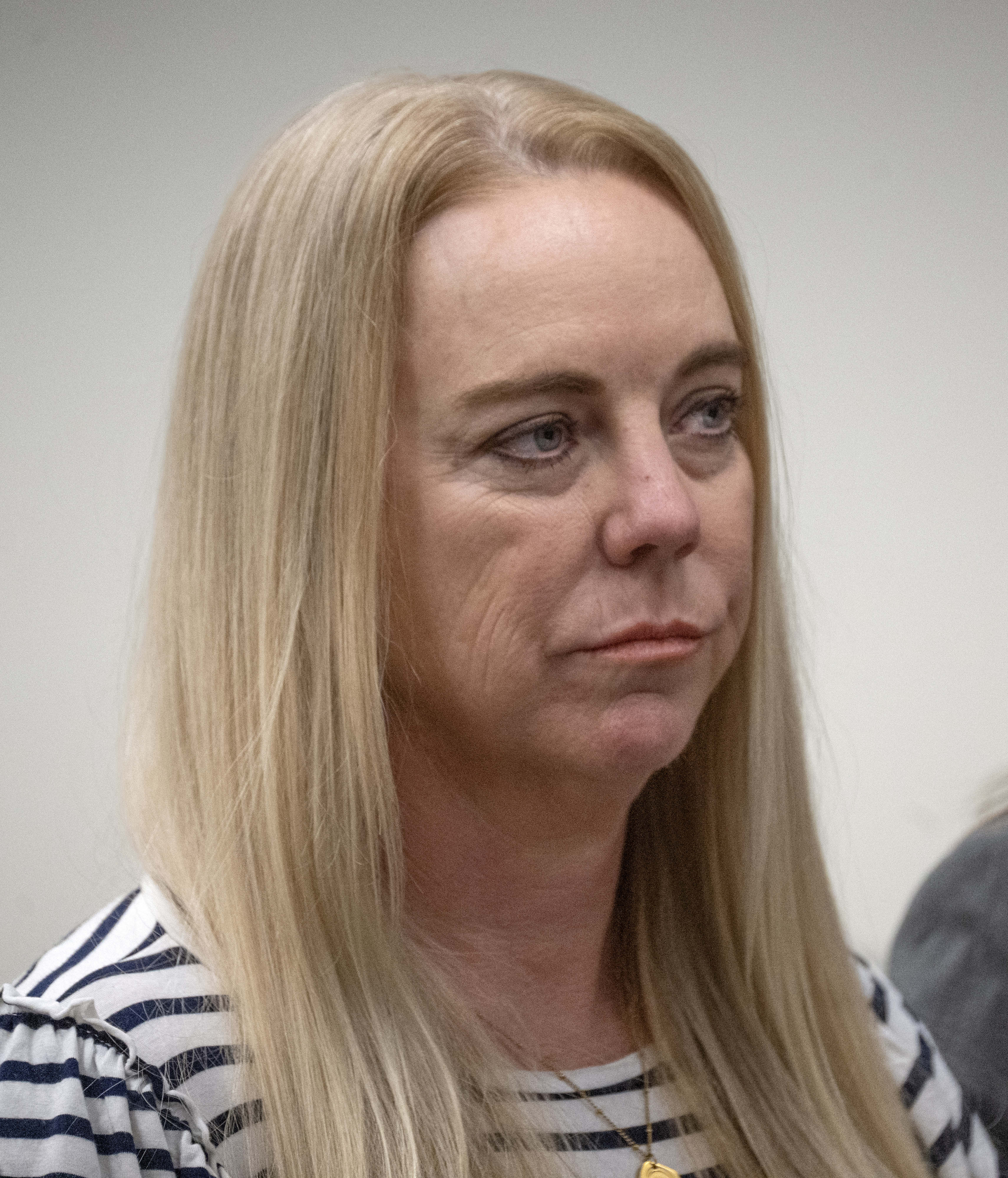 Tommi Jo Mejer, the mother of a 14-year-old accused of...