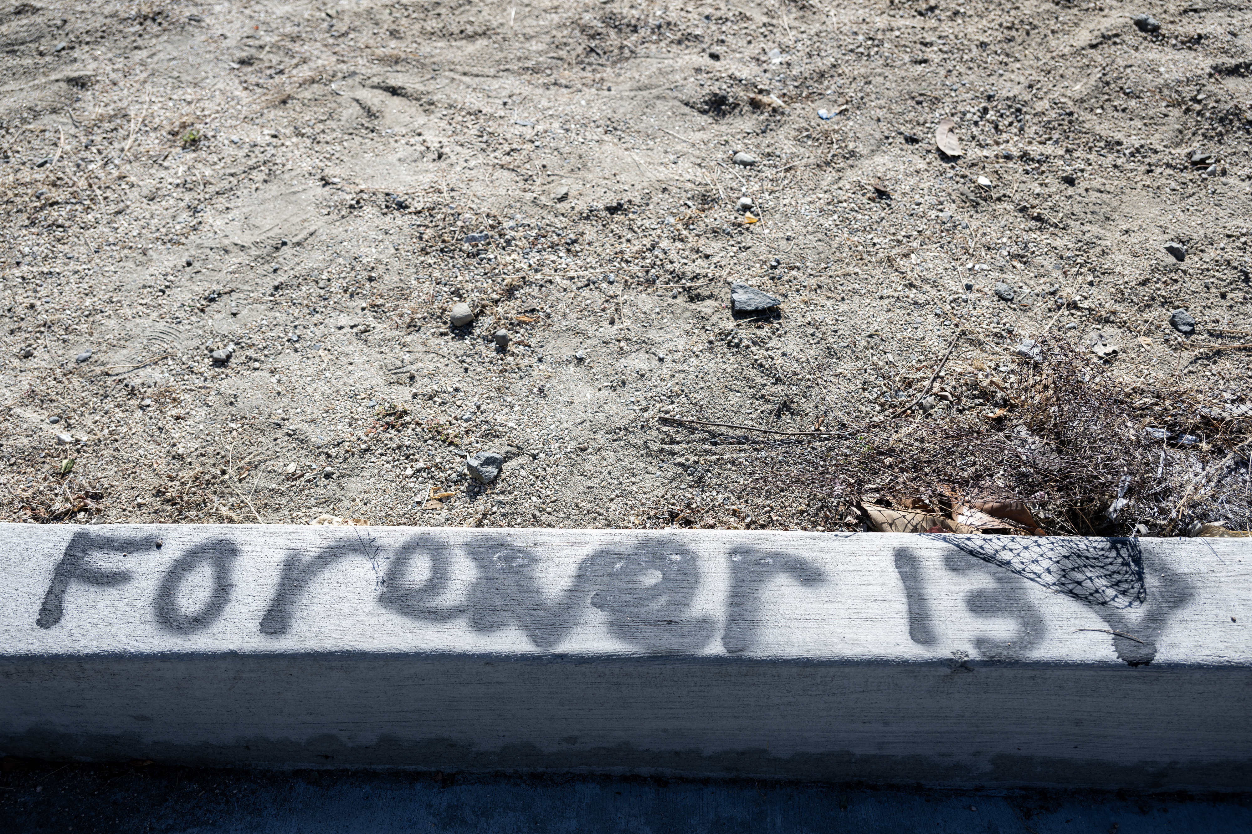 Messages are left at the crash site where a 13-year-old...