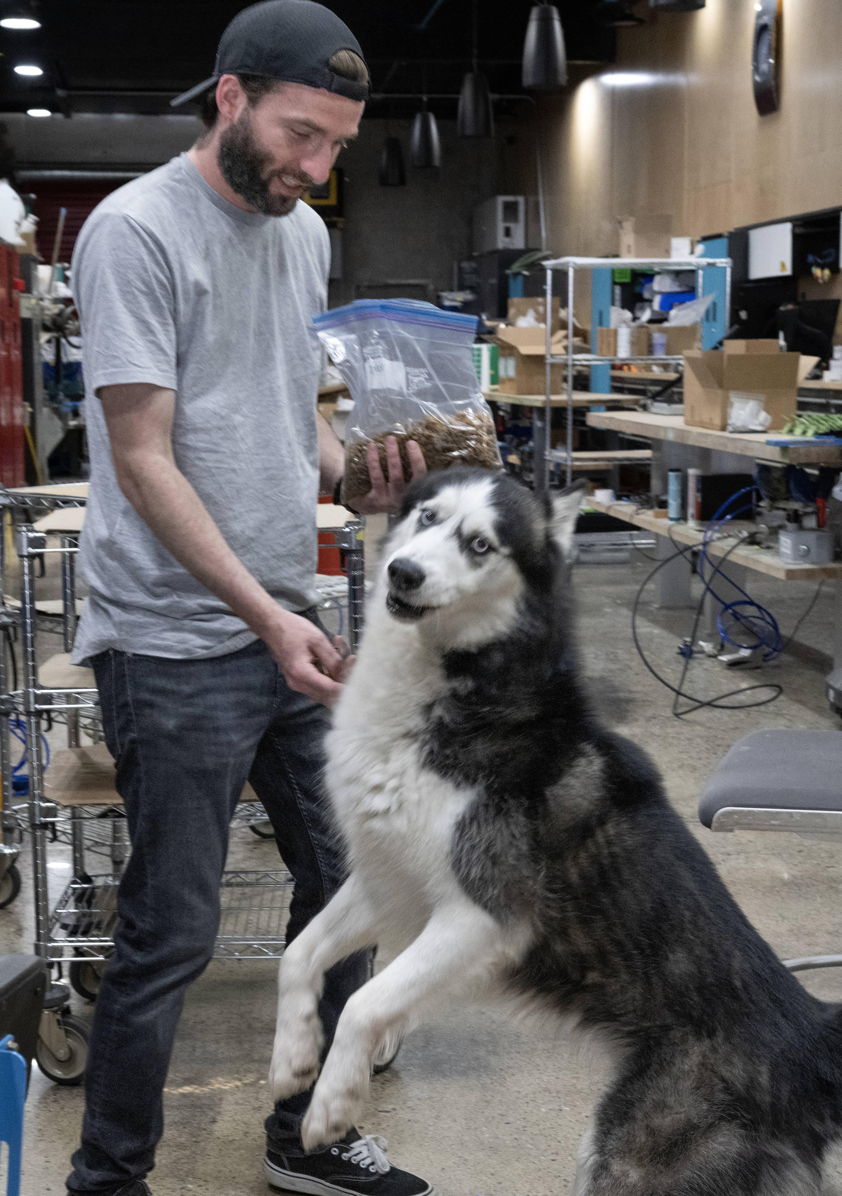 M.J. Heasley greets his dog, Buster, who spent about 16...