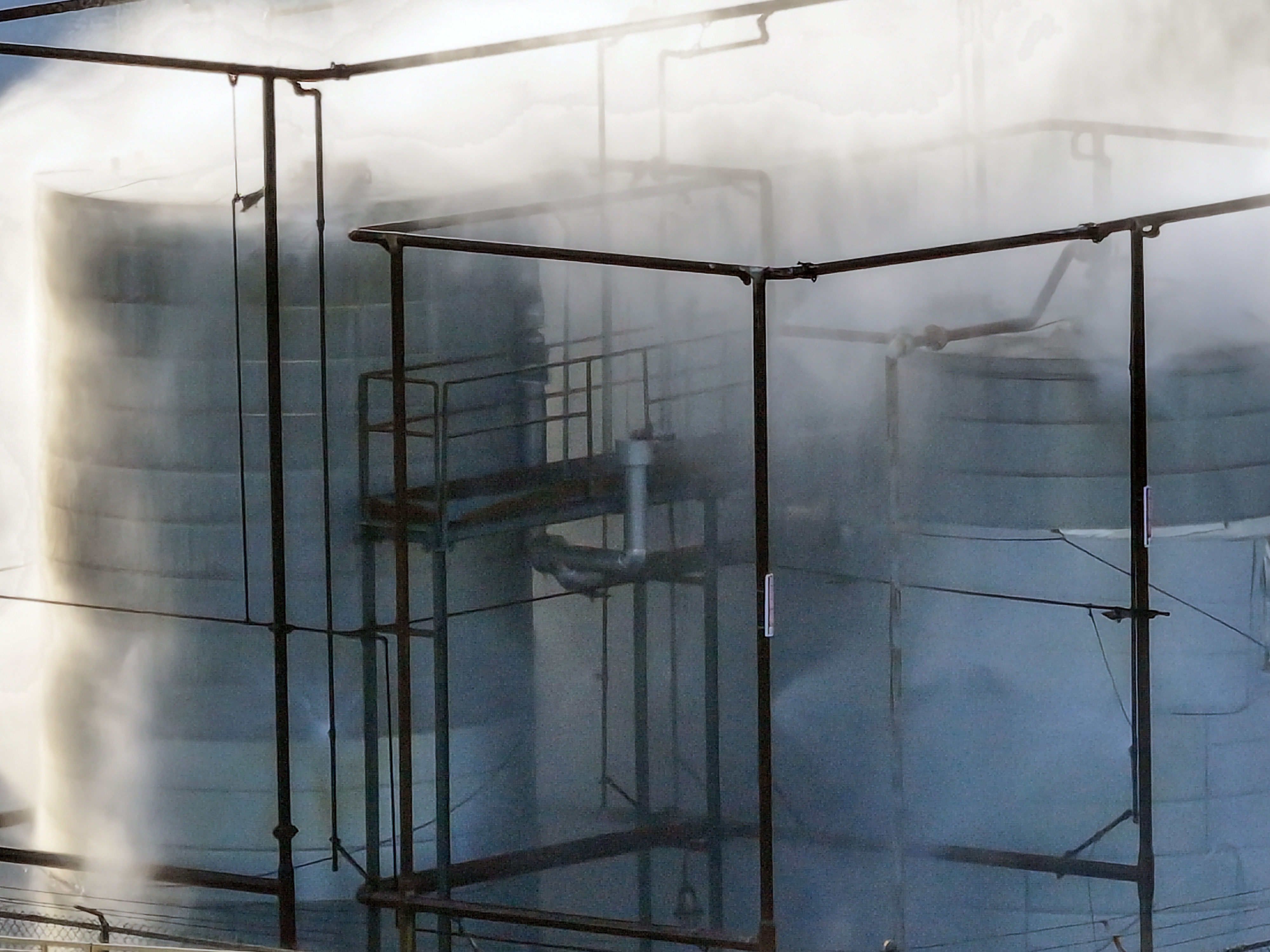 A pressurized tank filled with methyl methacrylate is sprayed with...