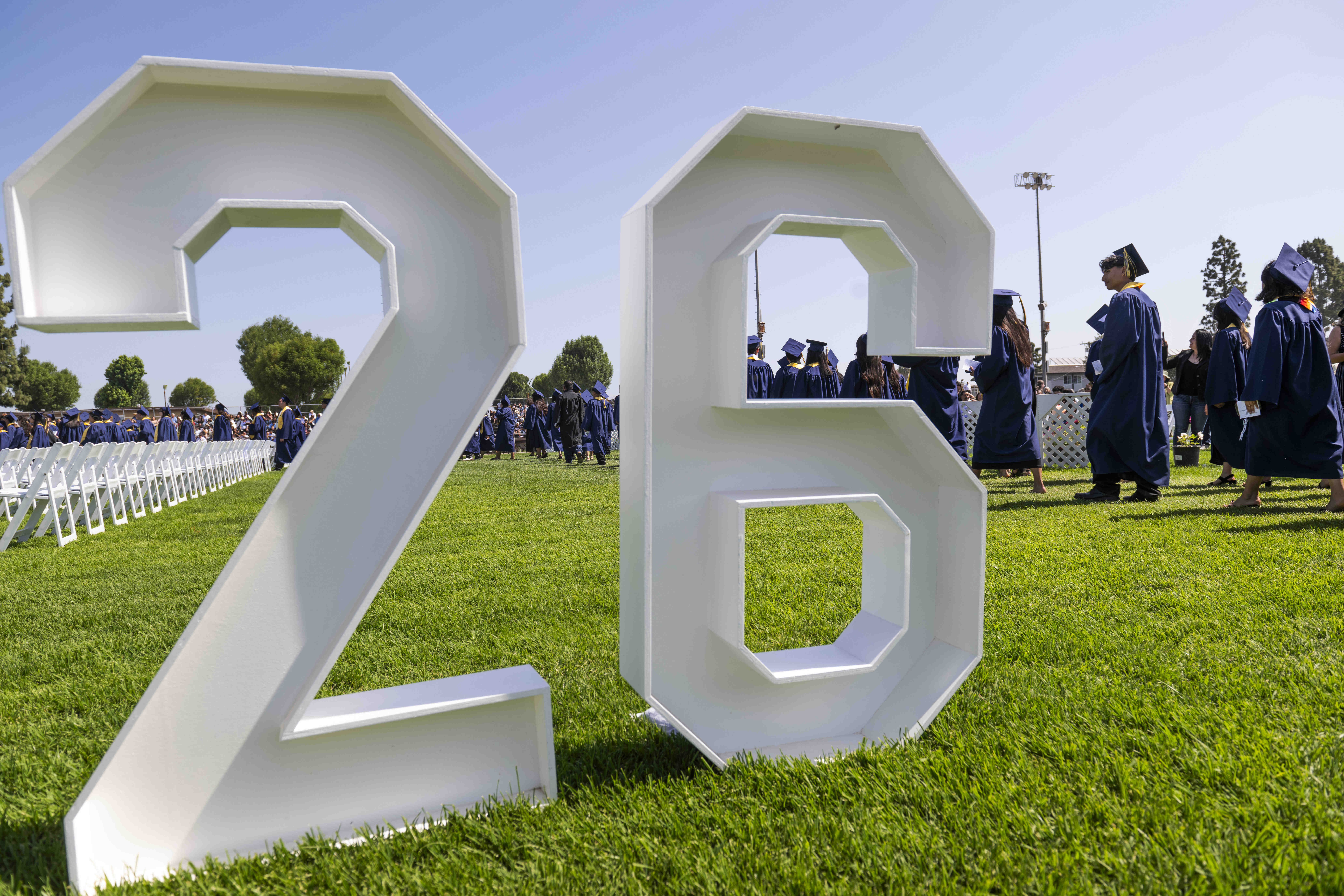 Graduates enter Handel Stadium at the start of the Anaheim...