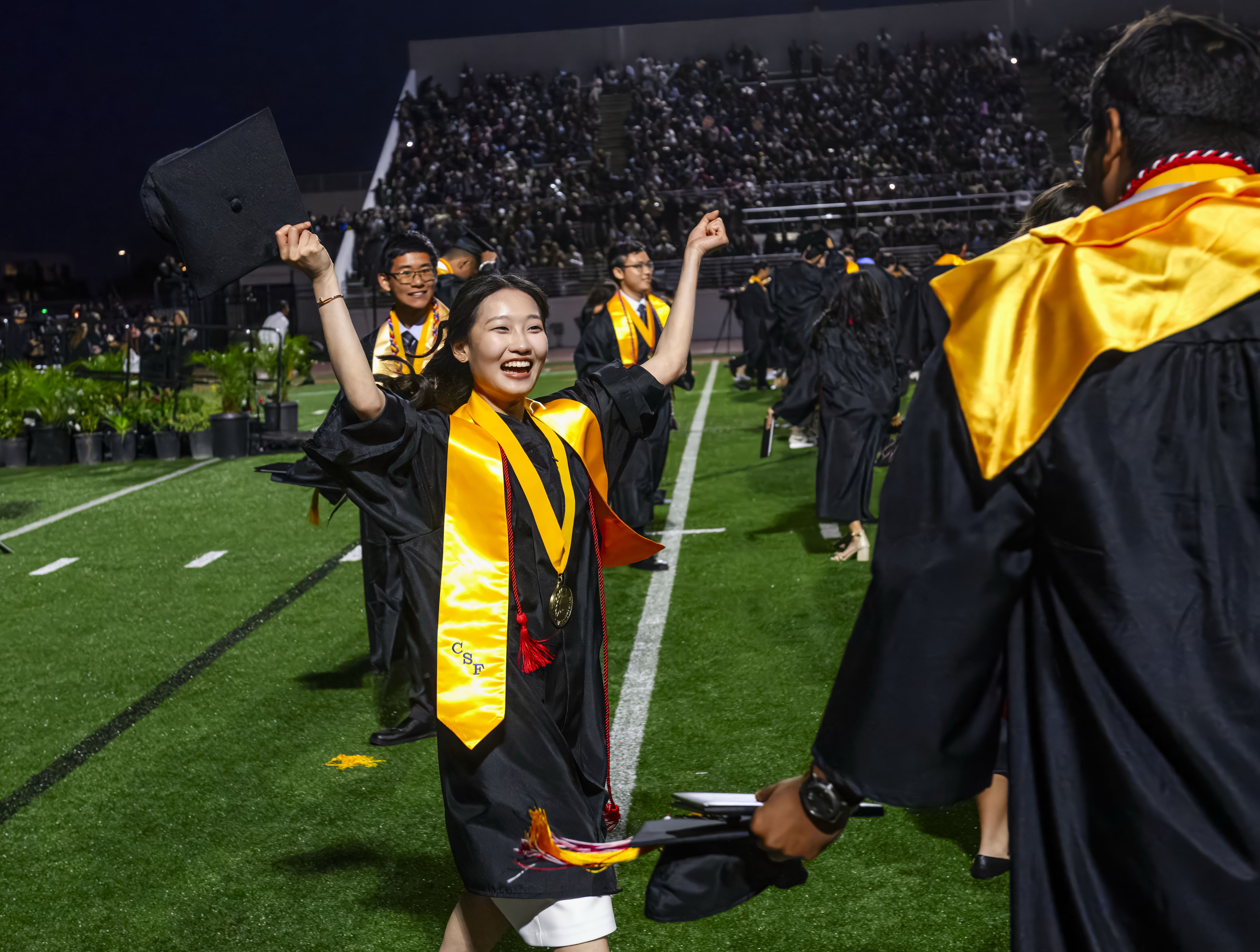 A jubilant Olivia Ng celebrates following the Troy High School...