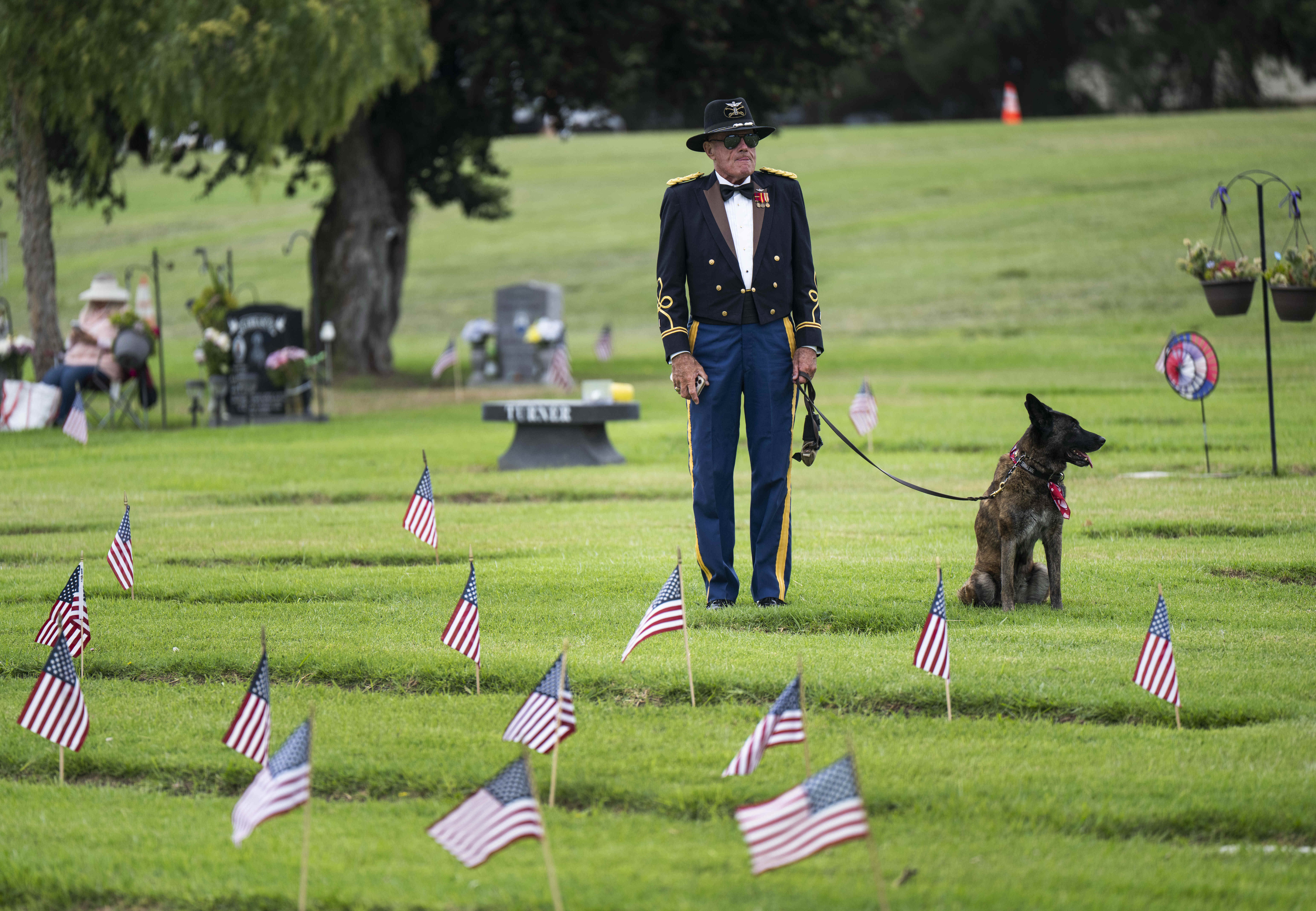 Marine Corps and Army veteran Scott Bergey waits with his...