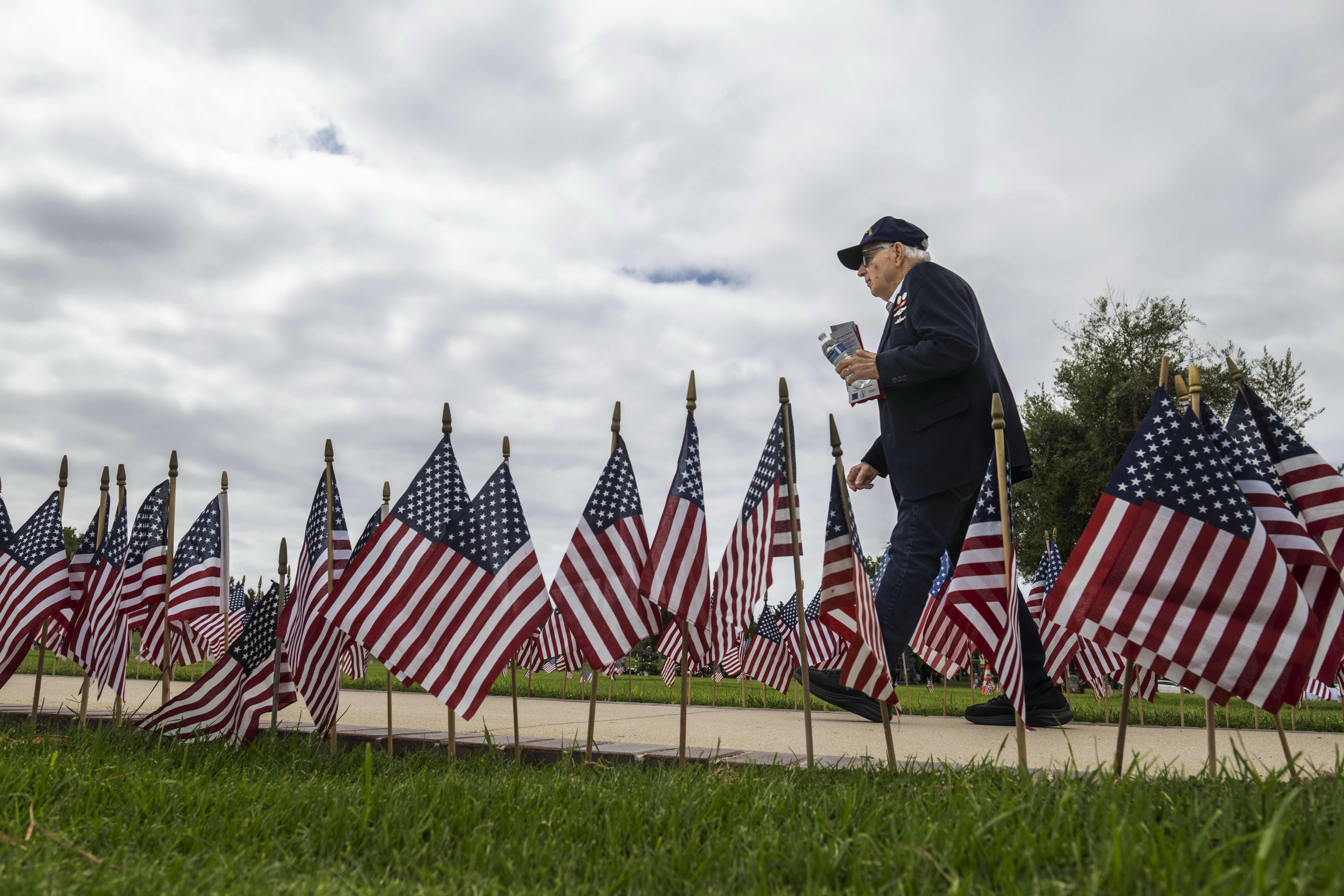 A veteran attends the Memorial Day ceremony at Harbor Lawn-Mt....