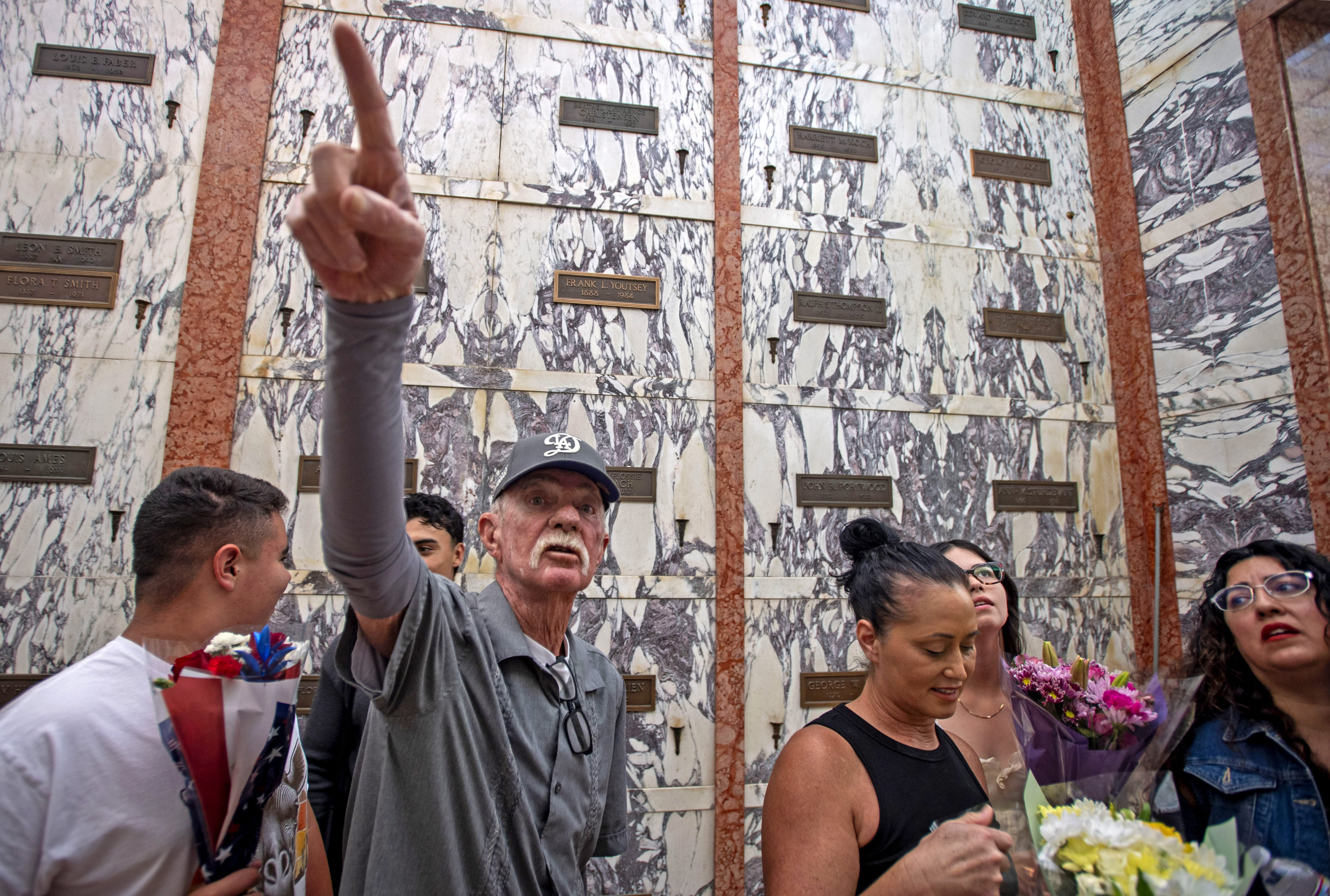 Vietnam War veteran Charles Cuttress points out other loved ones...