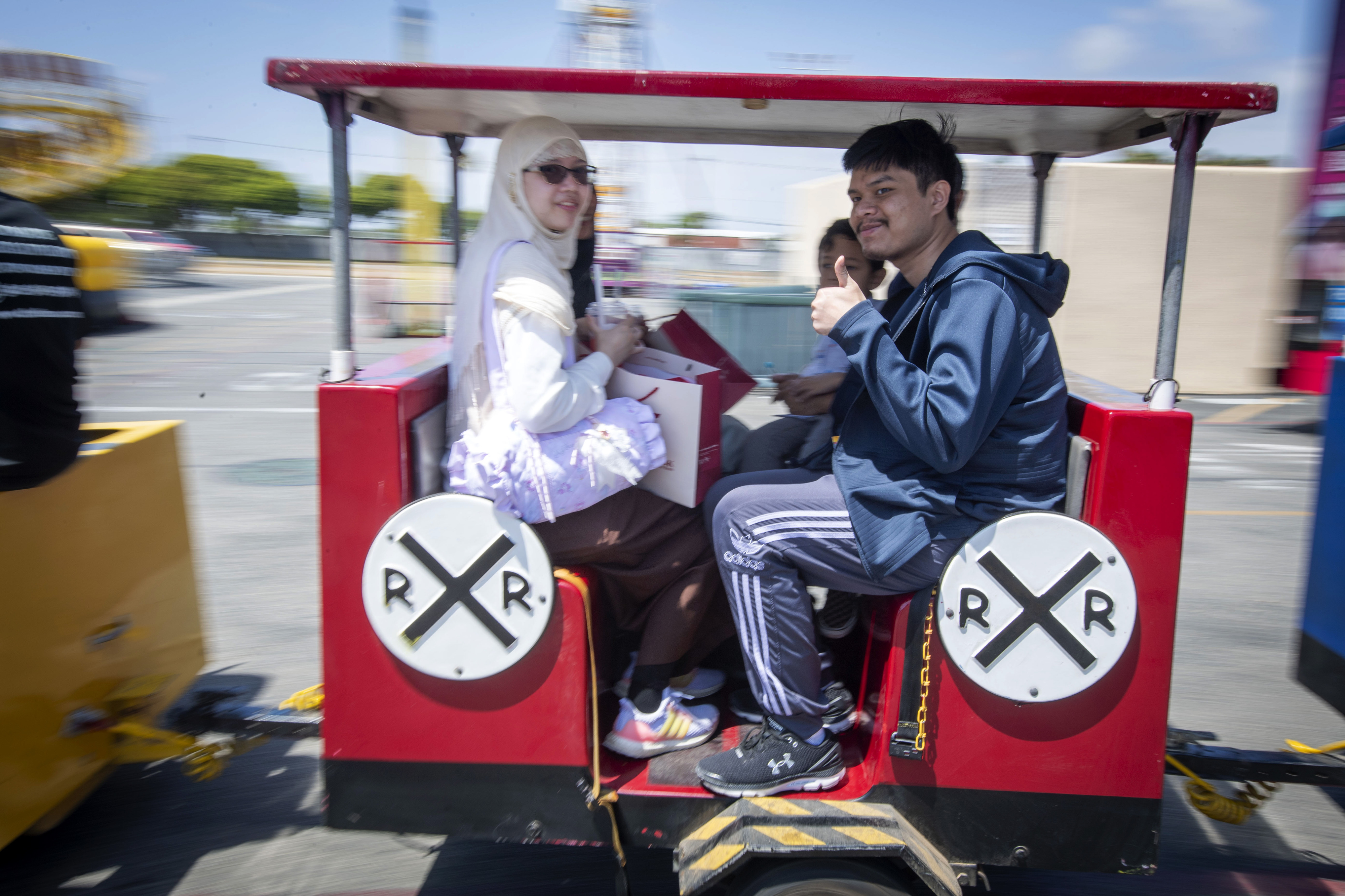 Visitors take in a train ride during the celebration of...