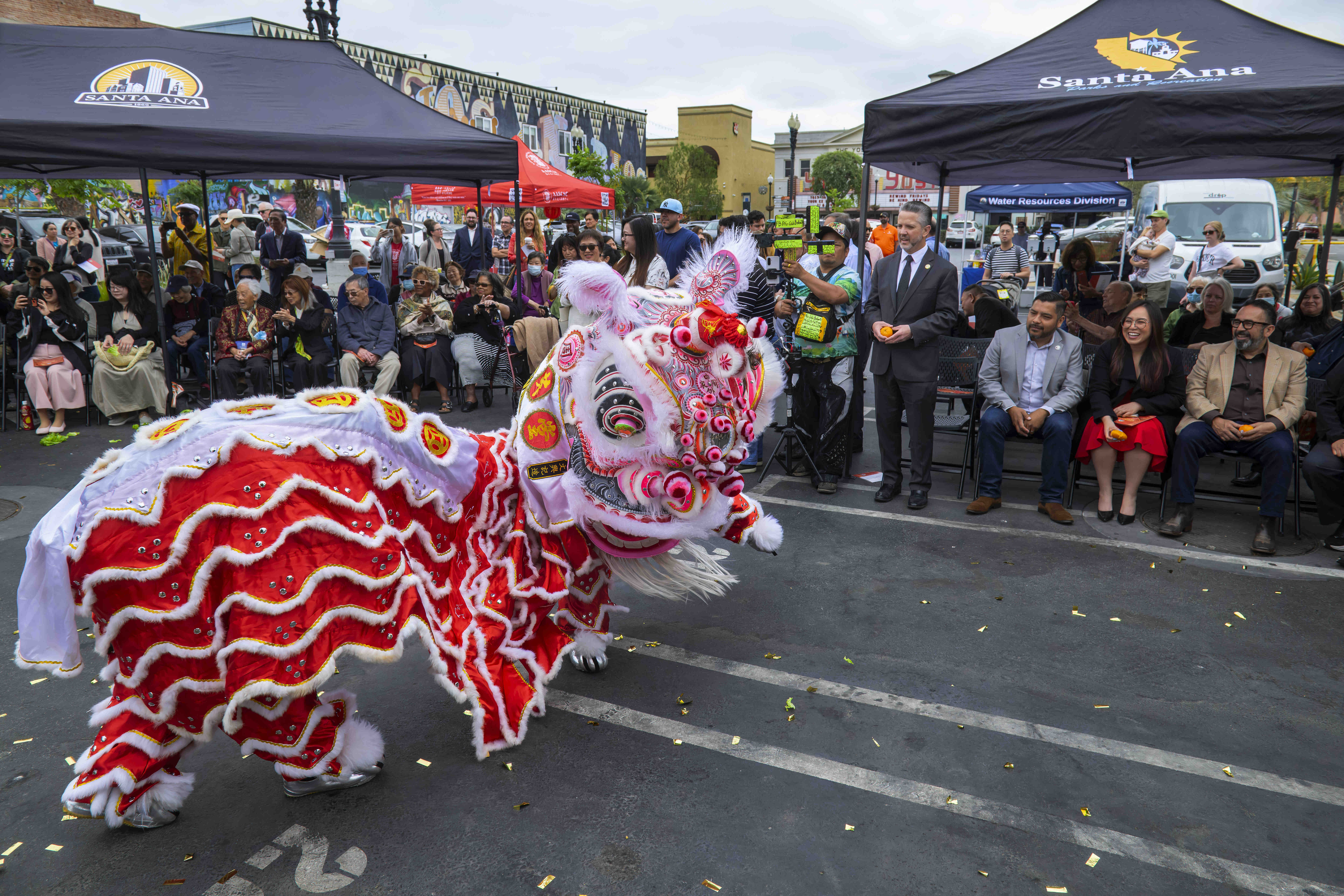 Lion dancers perform at the Chinatown Memorial unveiling ceremony in...