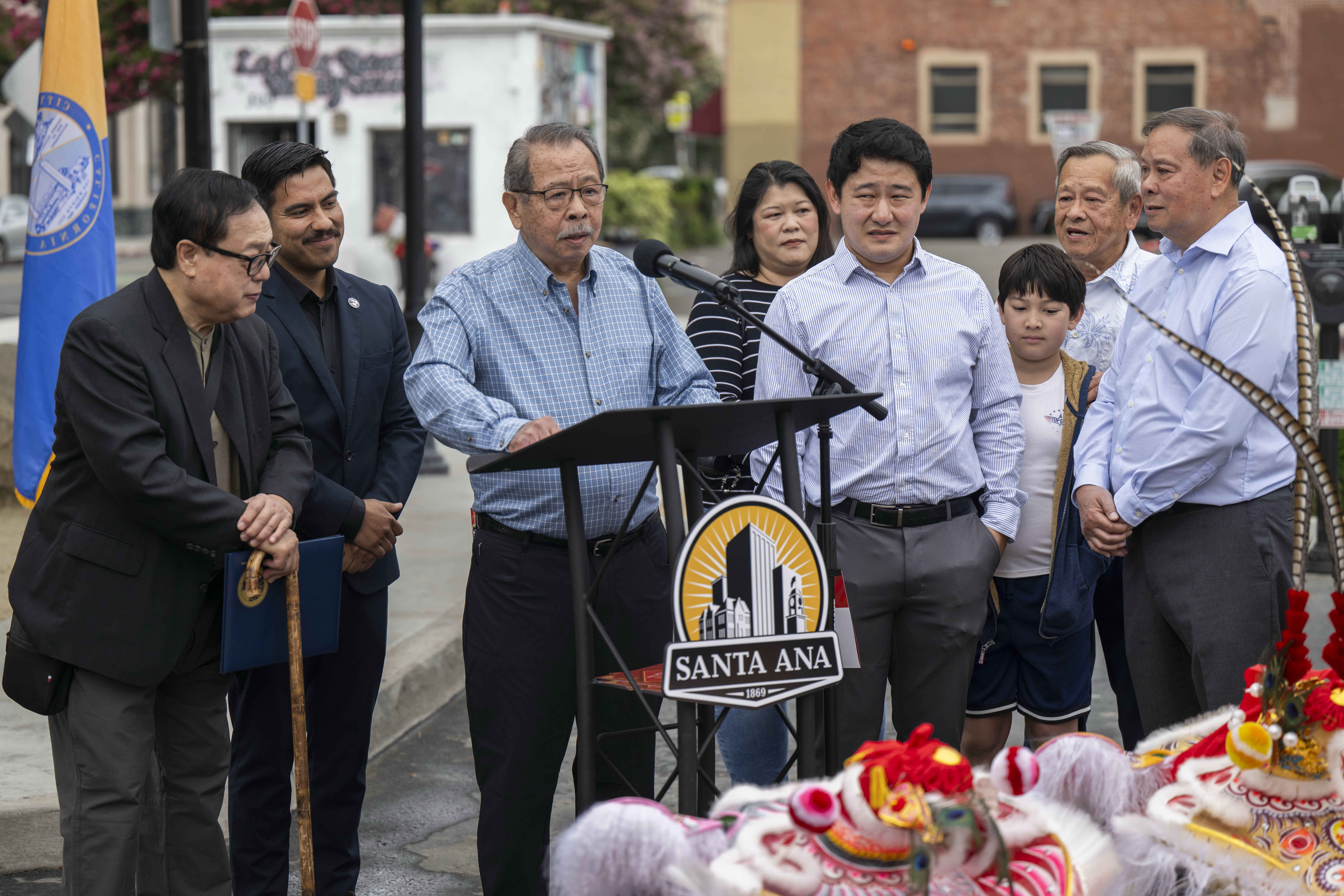 Louis Lau, representing other members of the Lau family addresses...