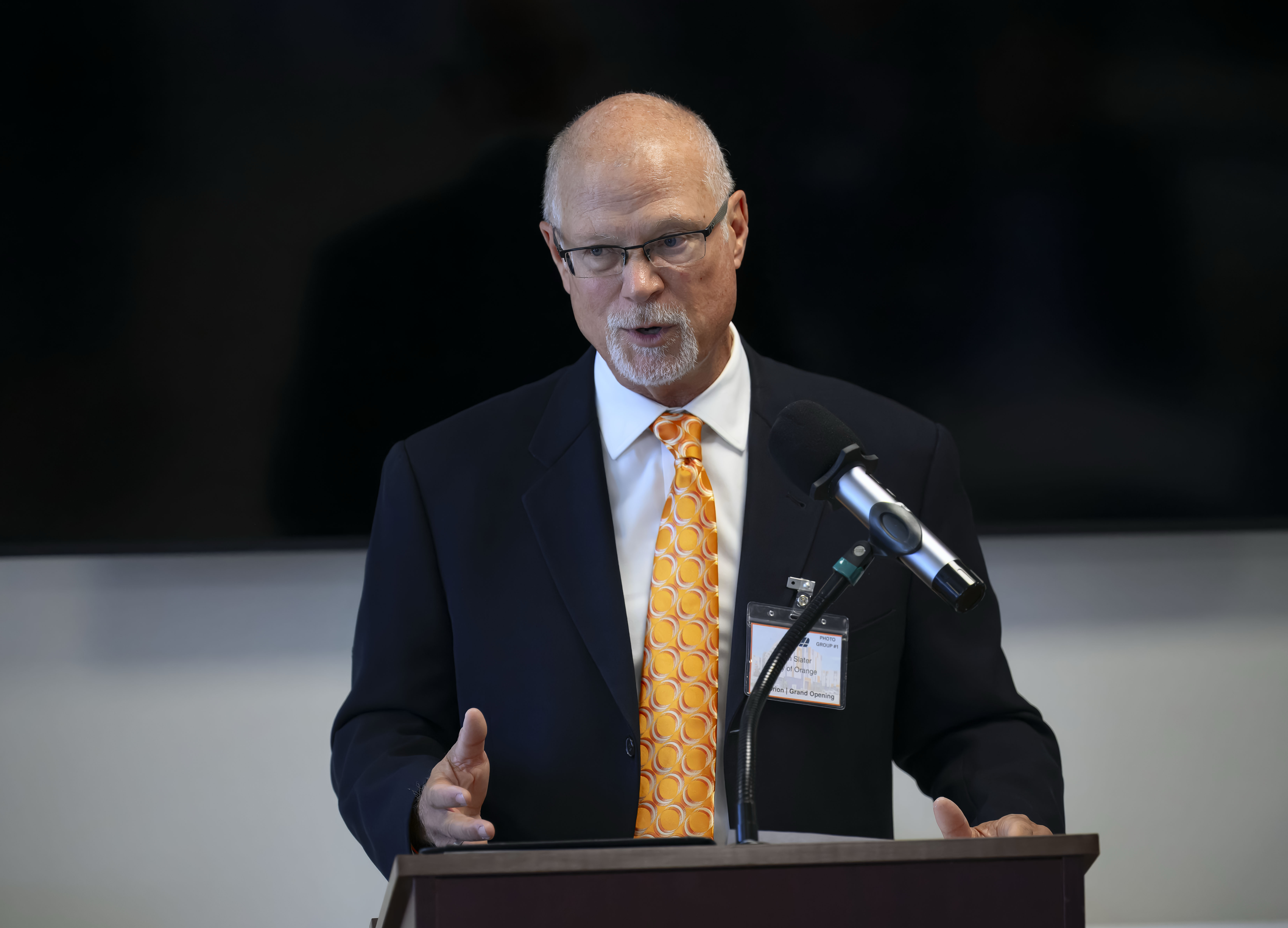 Orange Mayor Dan Slater delivers some remarks during an event...