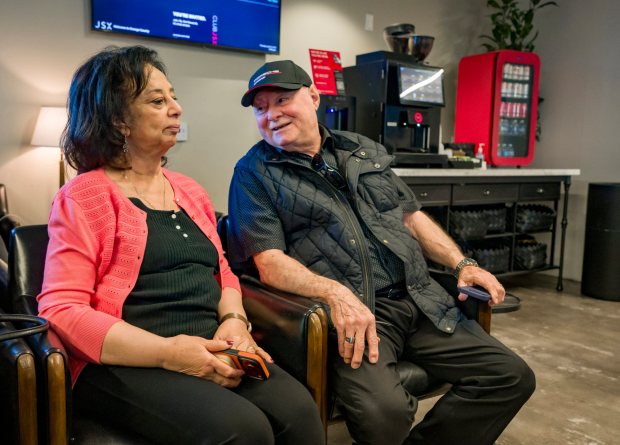 Huda and Saleem Lahlouh of Yorba Linda wait for their flight in the JSX terminal at John Wayne Airport in Costa Mesa on Thursday, April 23, 2026. (Photo by Leonard Ortiz, Orange County Register/SCNG)