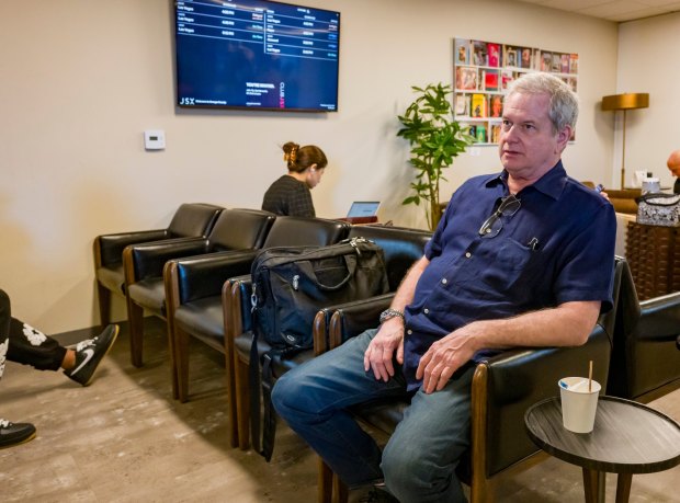 Jerry Leone of Anchorage waits for his flight to Las Vegas in the JSX terminal at John Wayne Airport in Costa Mesa on Thursday, April 23, 2026. (Photo by Leonard Ortiz, Orange County Register/SCNG)