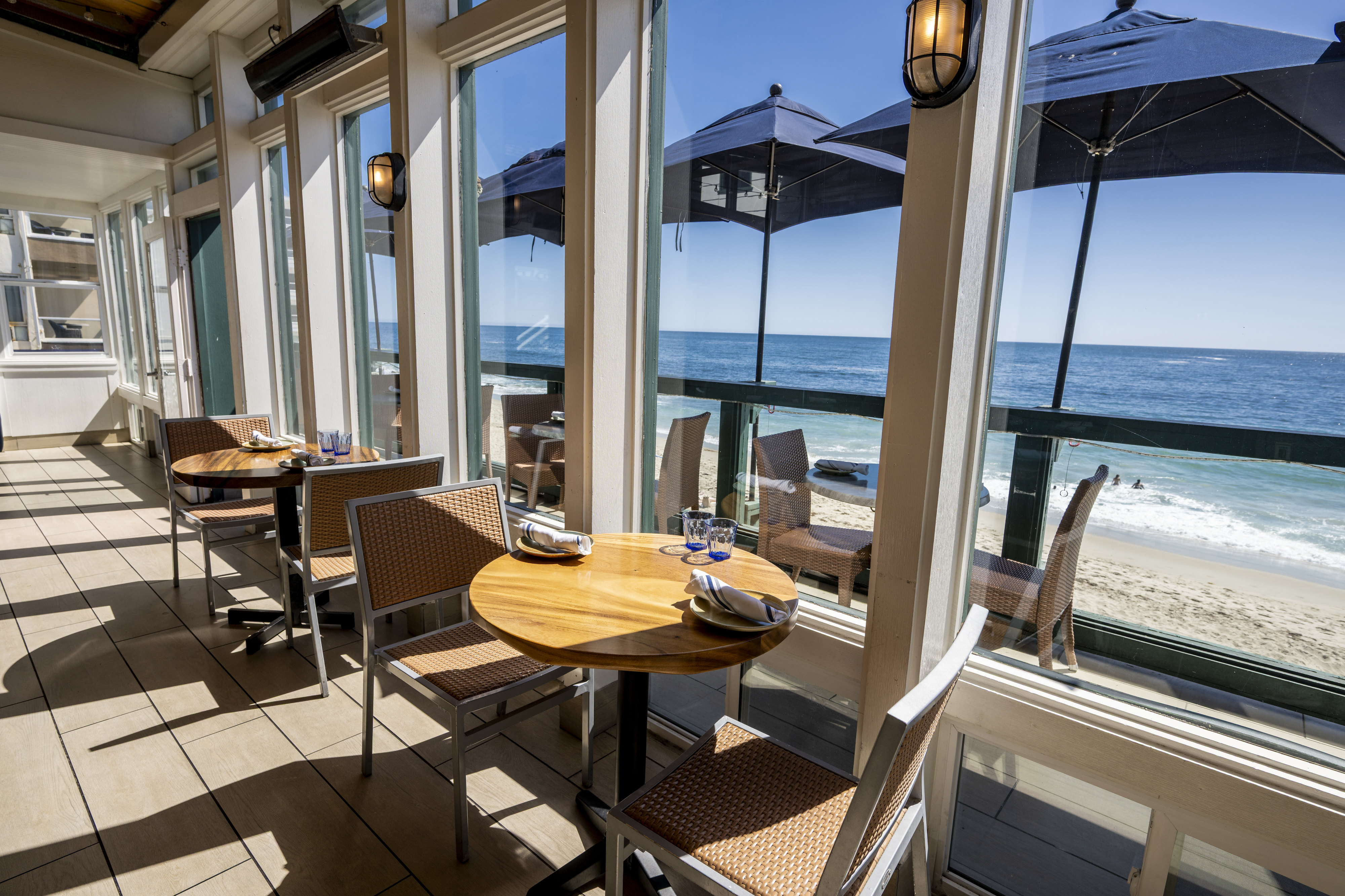 The dining room at Driftwood Kitchen with an ocean view...