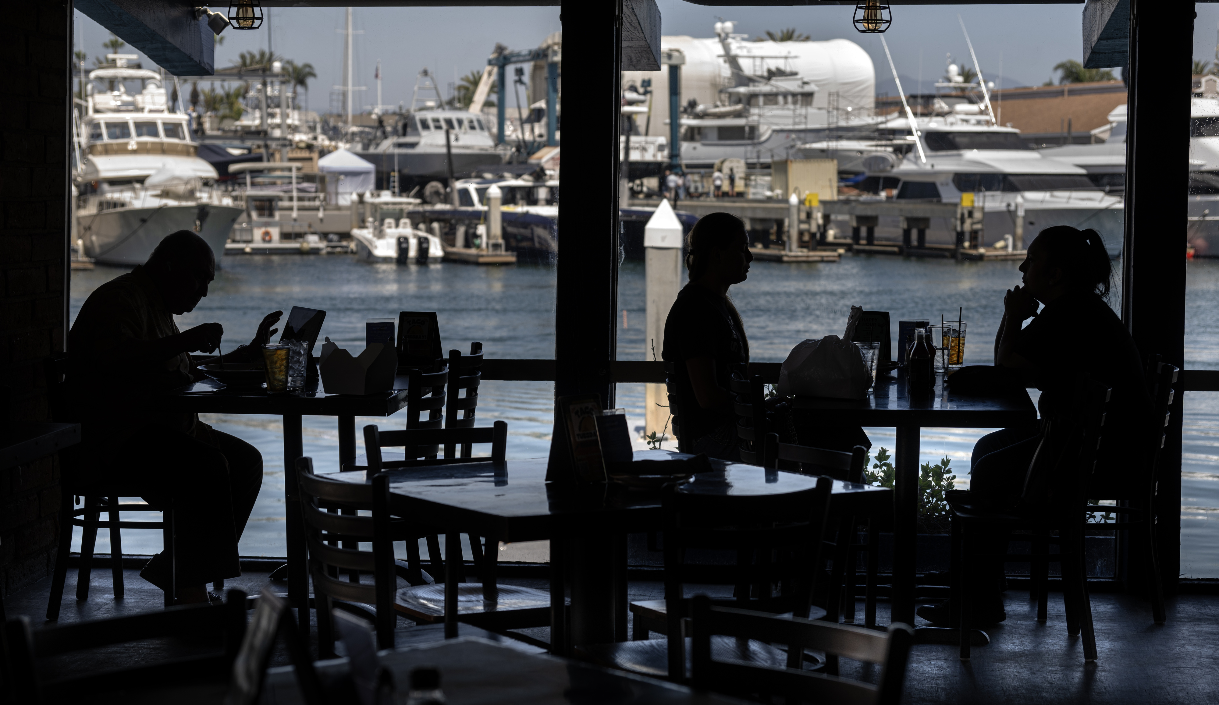 Woodyâs Wharf offers a scenic view for dinners on Tuesday,...