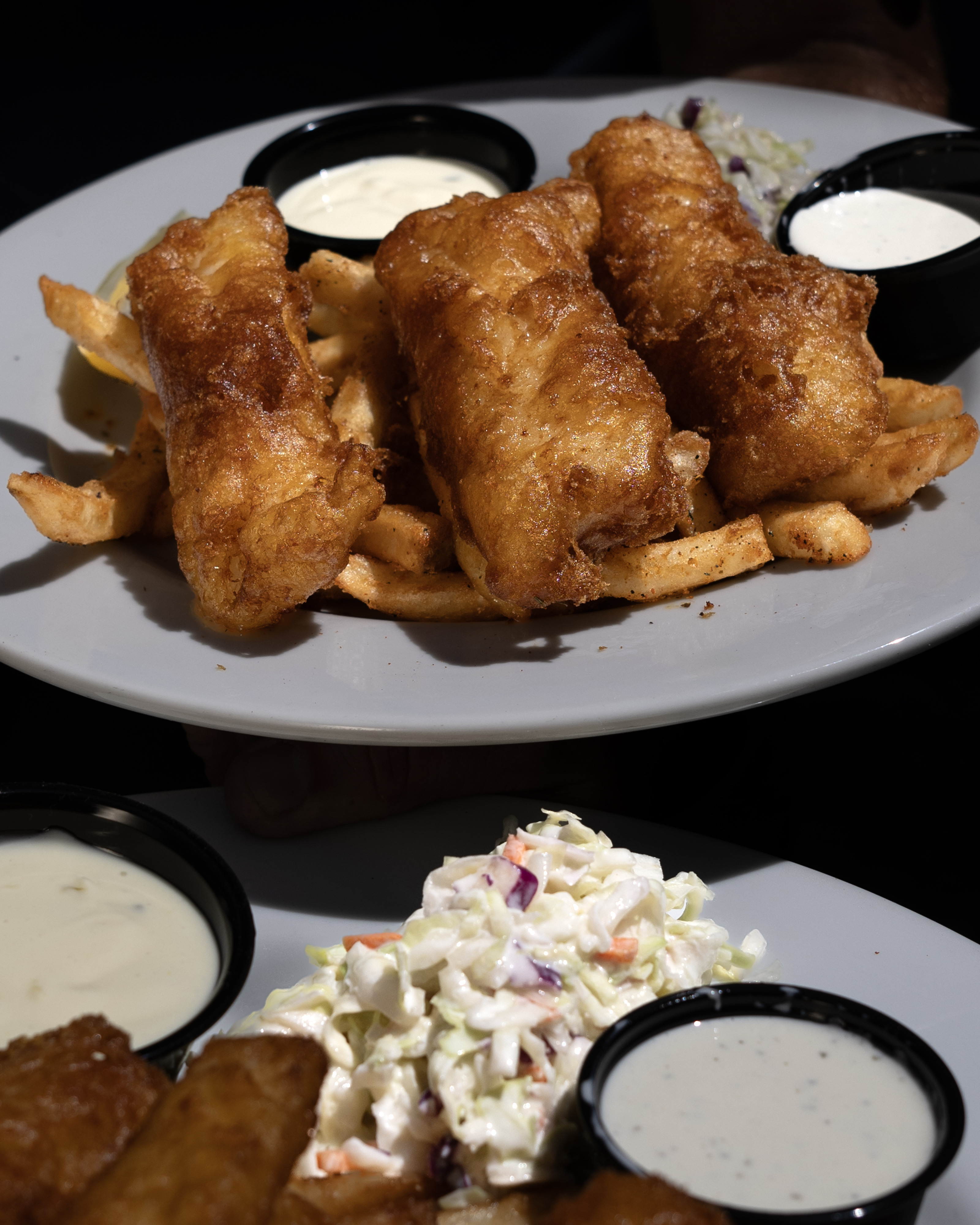 Woodyâs Wharf signature dish â Fish & Chips â served...