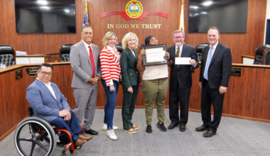 Cadet Foreman accepts his award alongside members of the Orange County Board of Education, Superintendent Dr. Stefan Bean, and his teacher, Elizabeth Wilson.