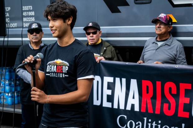 Outside the Pasadena Job Center Kailen Timbadia, 18, speaks to the press about lescaping the fire with a disabled mother and loosing their family home before heading on a charter bus with other Eaton fire survivors to Sacramento to demand a rescue plan for Altadena and Pasadena's recovery on Monday, May 18, 2026. (Photo by Sarah Reingewirtz, Los Angeles Daily News/SCNG)