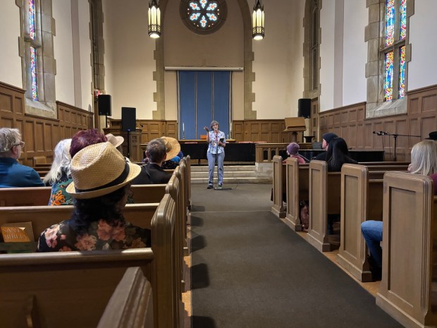 Susan Auerbach reads her poem during a panel about LA wildfire victims during the LitFest in the Dena at Pasadena Presbyterian Church on May 2, 2026. (Photo by Victoria Ivie.)