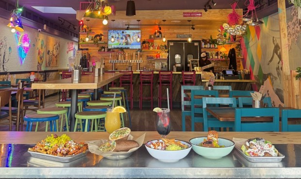 A variety of colorful dishes at the Pacific Beach location of Spitz Mediterranean Restaurant vibe with the playful, colorful interior of the eatery. (Courtesy of Spitz Mediterranean)