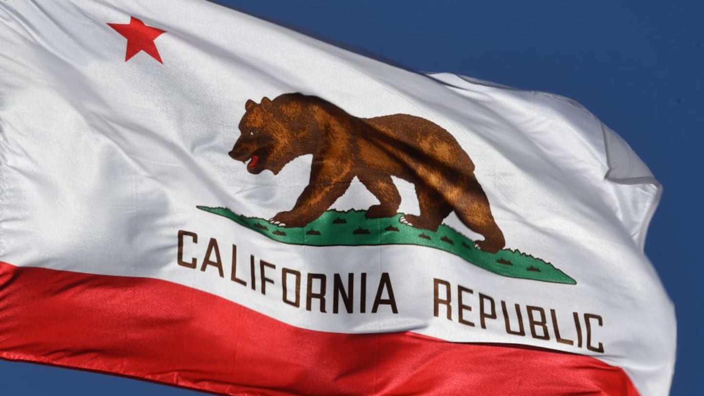 The California State flag outside City Hall, in Los Angeles. A Southern California mayor has agreed to plead guilty to acting as an illegal agent for the Chinese government and has resigned from her city position.