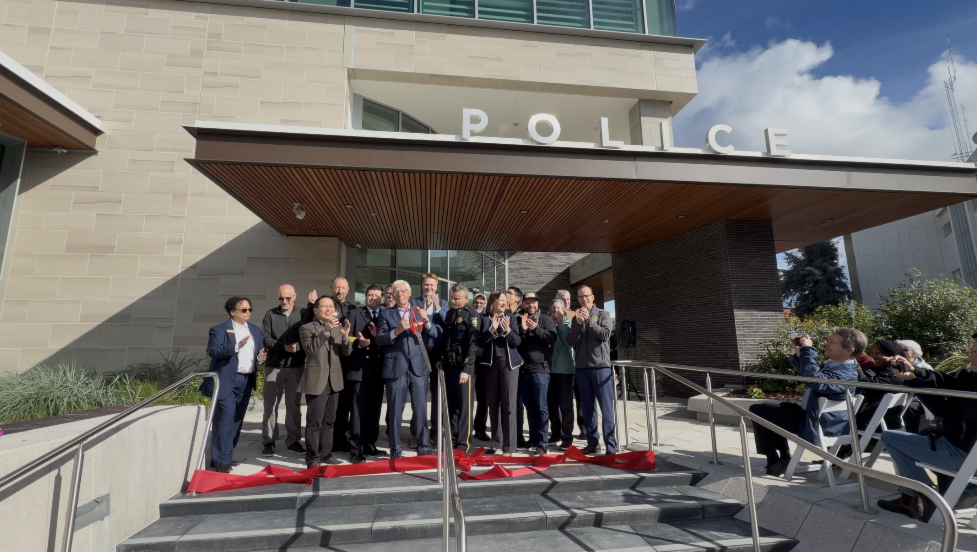 People standing outside a police station in Palo Alto, California