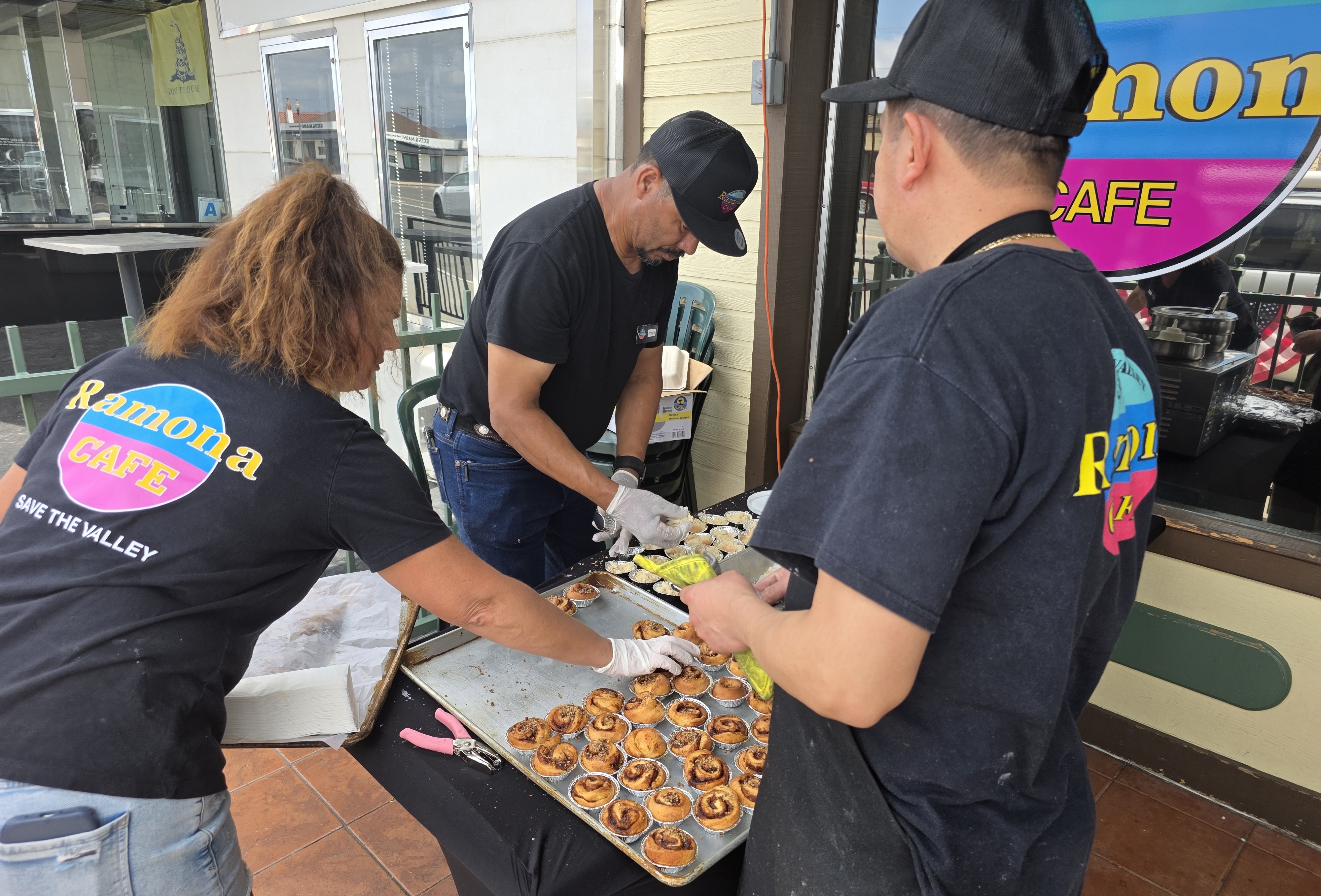 Ramona Cafe crew setting out samples of the restaurantâs famous...