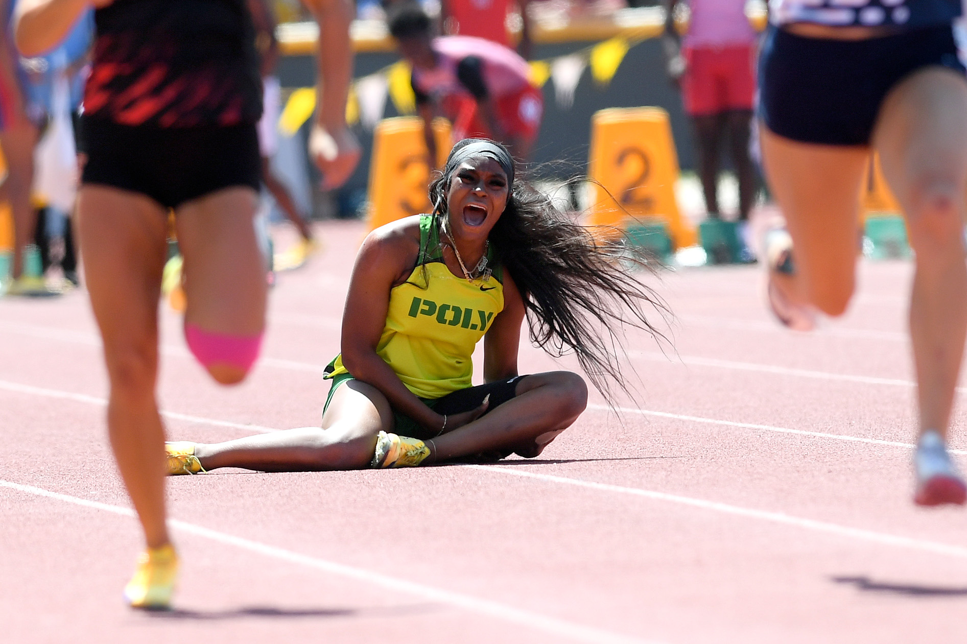Long Beach Polyâs Aniyah Brooks looks on after falling during...