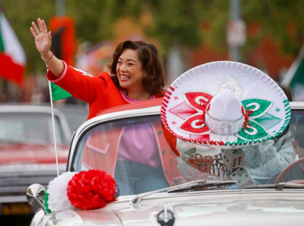 Santa Clara County Supervisor Betty Duong heads south down South King Road in a vintage police car during the 3rd Annual San Jose Cinco de Mayo Cultural Parade & Festival in San Jose, Calif., on Sunday, May 3, 2026. (Nhat V. Meyer/Bay Area News Group)