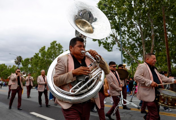 Musicians head south down South King Road in a vintage police car during the 3rd Annual San Jose Cinco de Mayo Cultural Parade & Festival in San Jose, Calif., on Sunday, May 3, 2026. (Nhat V. Meyer/Bay Area News Group)