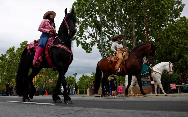 Riders head south down South King Road in a vintage police car during the 3rd Annual San Jose Cinco de Mayo Cultural Parade & Festival in San Jose, Calif., on Sunday, May 3, 2026. (Nhat V. Meyer/Bay Area News Group)