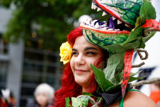 Pepper Jaq, of Richmond dressed as Poison Ivy, made the plants from foam clay for FanimeCon at San Jose McEnery Convention Center in San Jose, Calif., on Sunday, May 28, 2023. (Shae Hammond/Bay Area News Group)