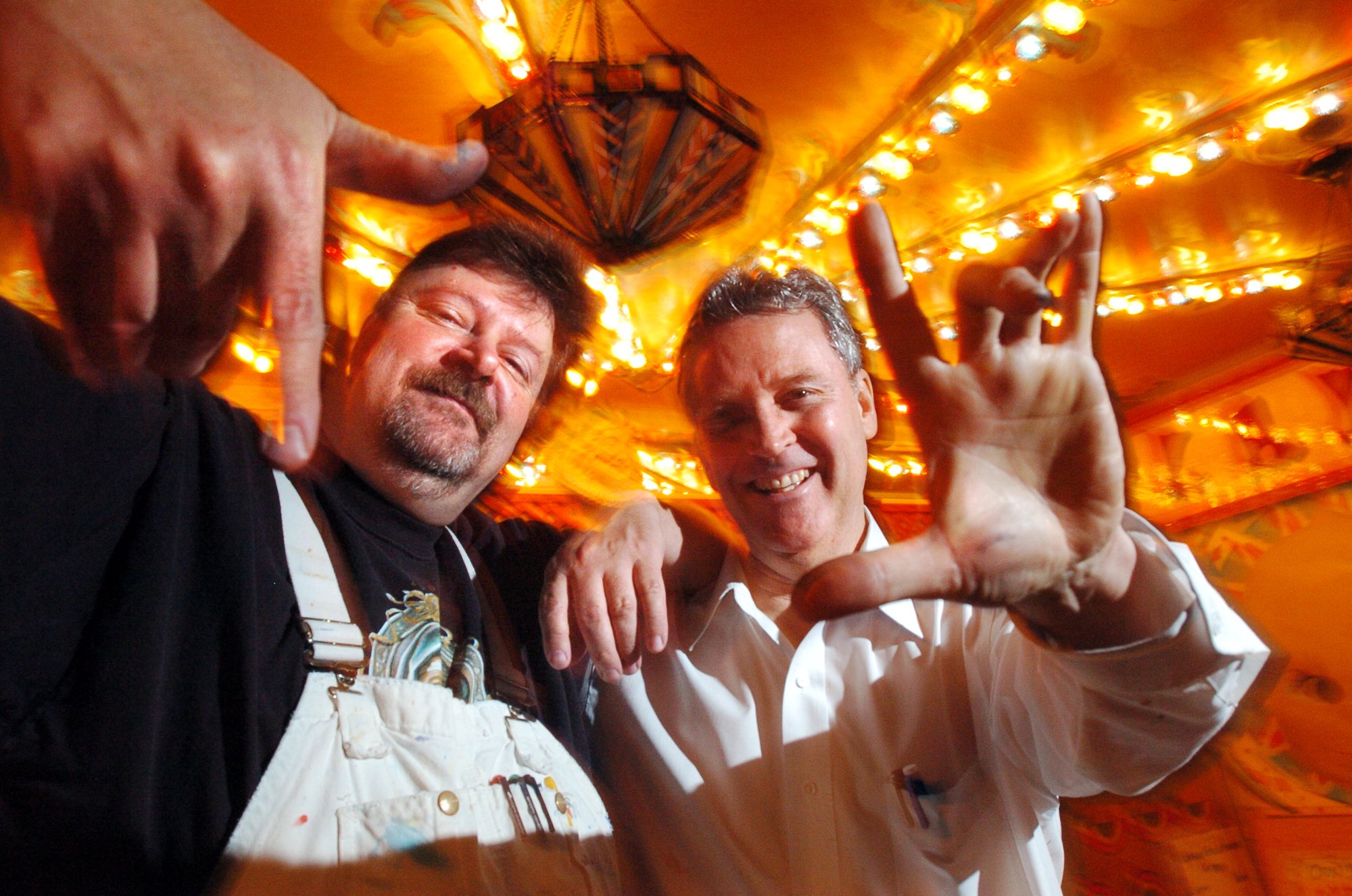 Ed Cassel, at right, and Dan Fontes stand inside one...