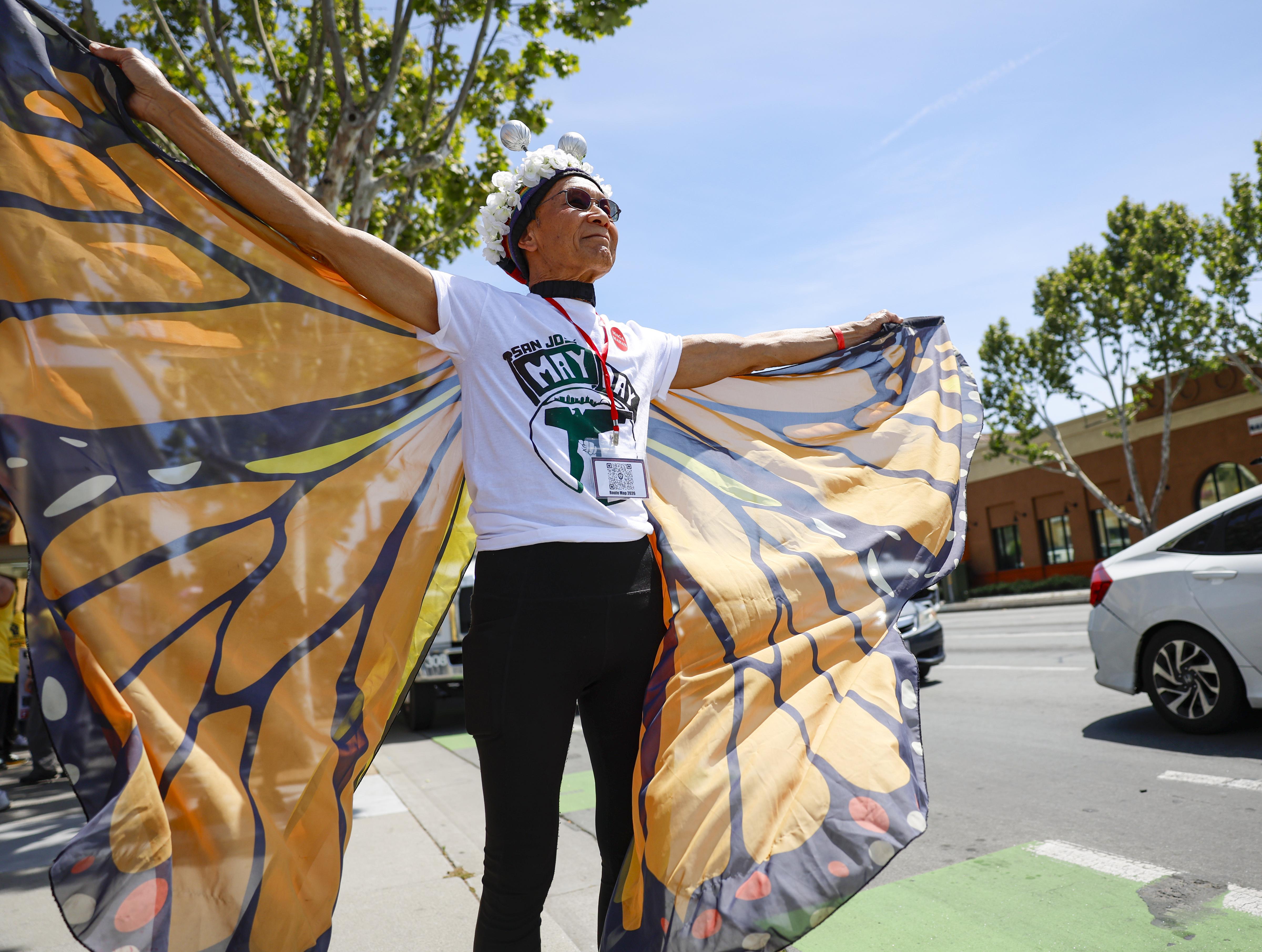 Sharat Lin, of San Jose, attends a May Day protest...