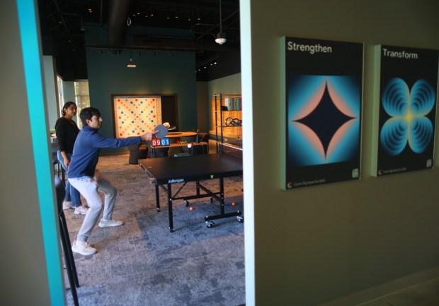 Workers take a break to play ping pong in a game room at the Google Meadow Point Campus on Monday, May 11, 2026, in San Jose, Calif.  (Aric Crabb/Bay Area News Group)