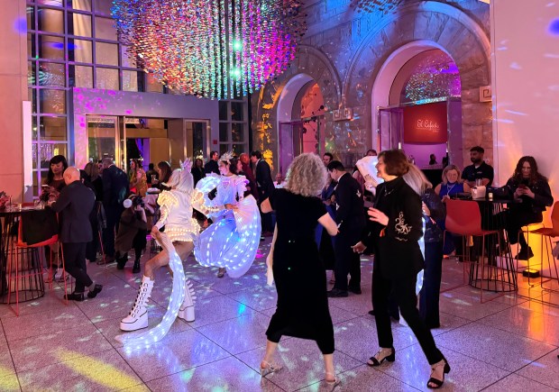 Performers with illuminated outfits were part of the after-party for the San Jose Museum of Art Gala and Auction, held inside the museum on Saturday, April 25, 2026. (Sal Pizarro/Bay Area News Group)